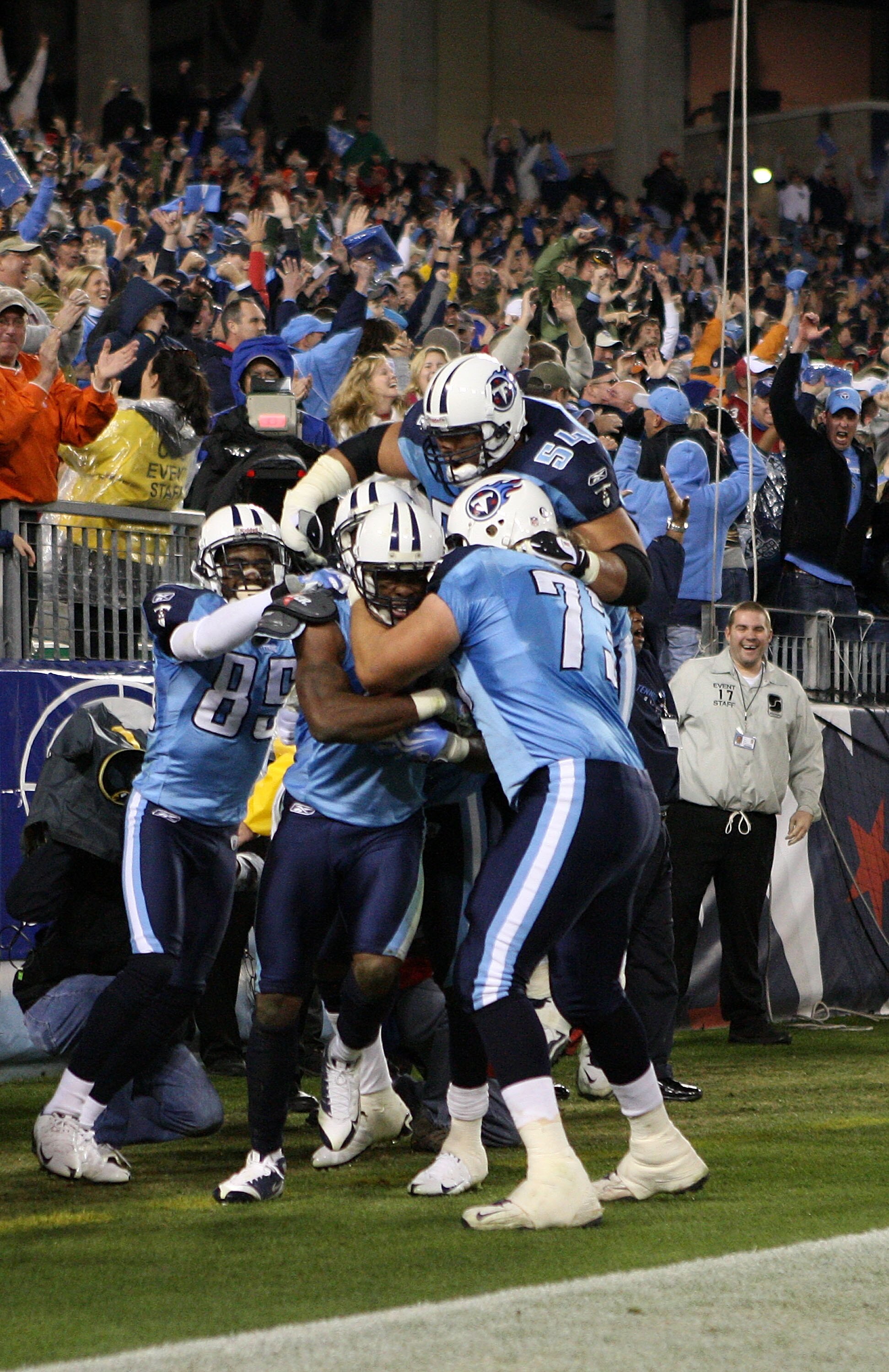 NASHVILLE, TN - NOVEMBER 29: Kenny Britt #18 of the Tennessee Titans celebrates with teammate Jevon Kearse #90 after catching the game-winning touchdown to give the Titans a 20-17 victory over the Arizona Cardinals during their game at LP Field on Novemb NASHVILLE, TN - NOVEMBER 29: Kenny Britt #18 of the Tennessee Titans celebrates with teammate Jevon Kearse #90 after catching the game-winning touchdown to give the Titans a 20-17 victory over the Arizona Cardinals during their game at LP Field on Novemb