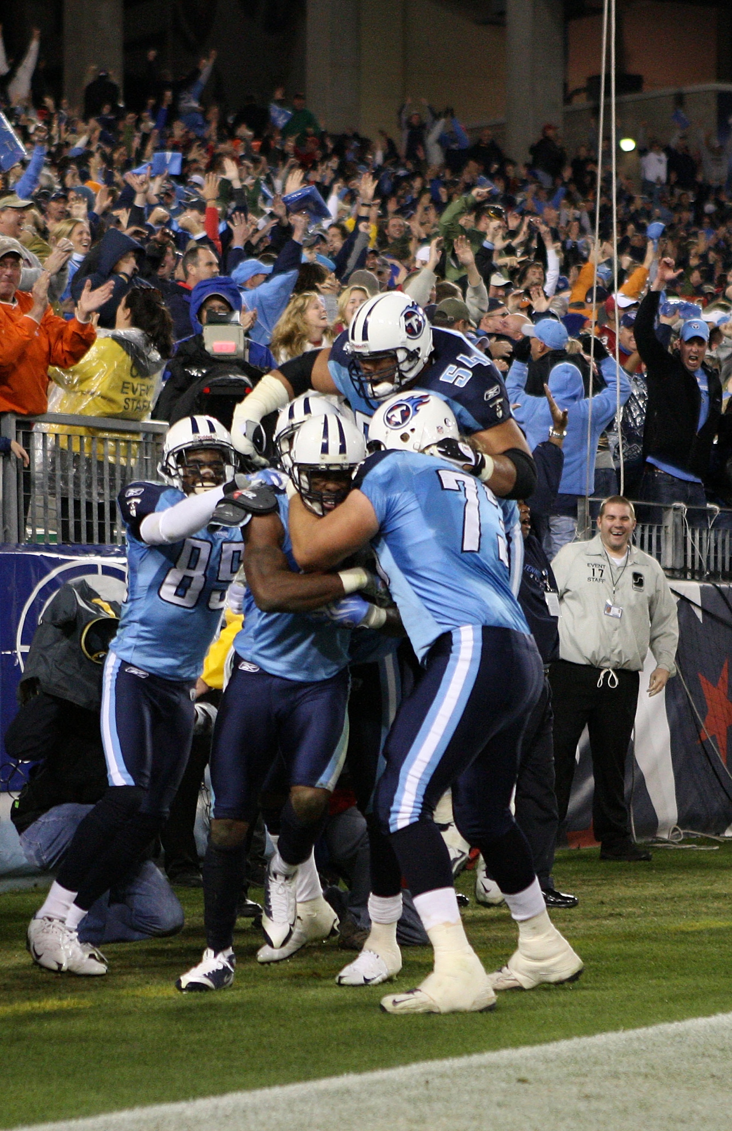 NASHVILLE, TN - NOVEMBER 29:  Kenny Britt #18 of the Tennessee Titans celebrates with teammate Jevon Kearse #90 after catching the game-winning touchdown to give the Titans a 20-17 victory over the Arizona Cardinals during their game at LP Field on Novemb