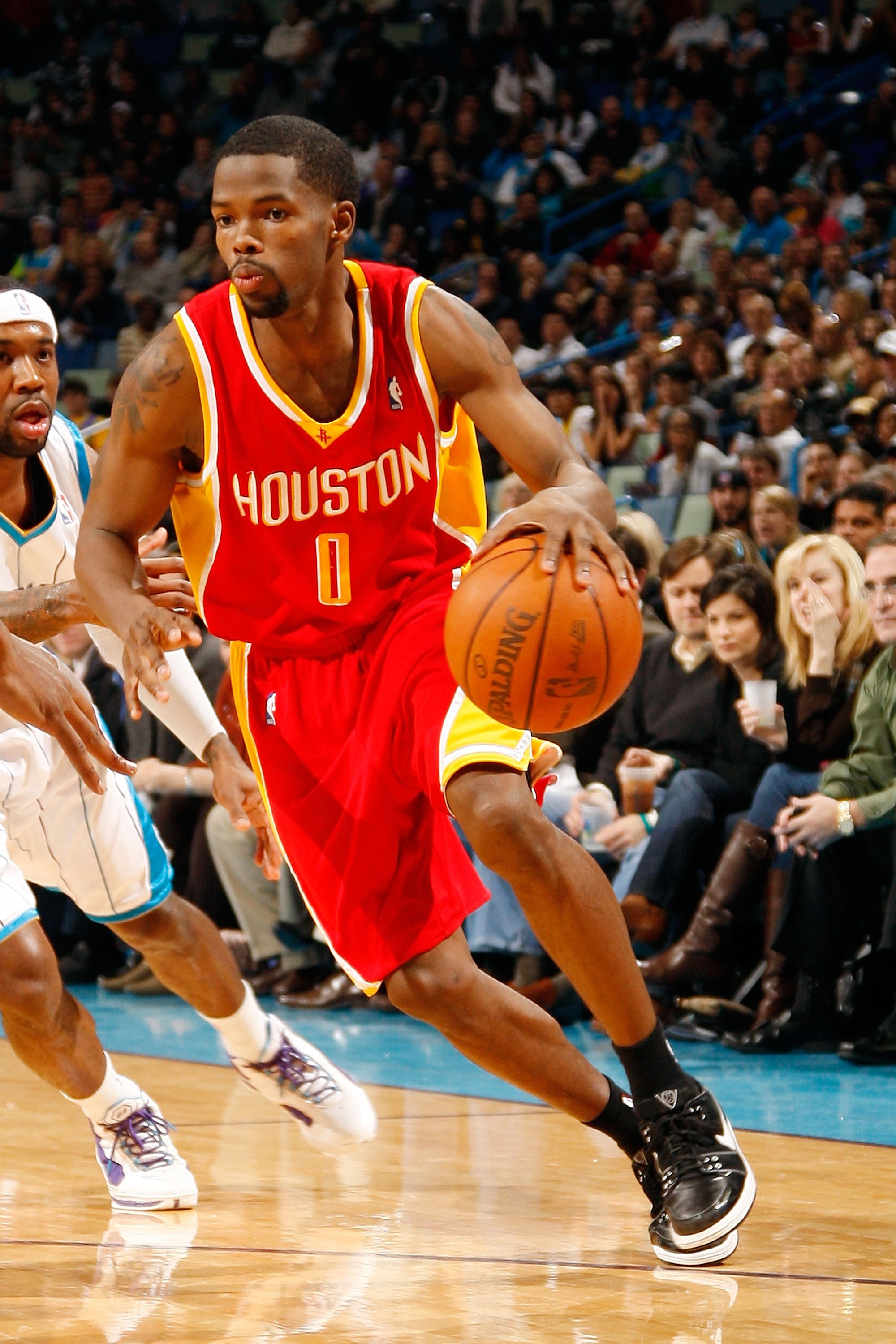 NEW ORLEANS - JANUARY 02:  Aaron Brooks #0 of the Houston Rockets drives the ball against the New Orleans Hornets at the New Orleans Arena on January 2, 2010 in New Orleans, Louisiana.  NOTE TO USER: User expressly acknowledges and agrees that, by downloa