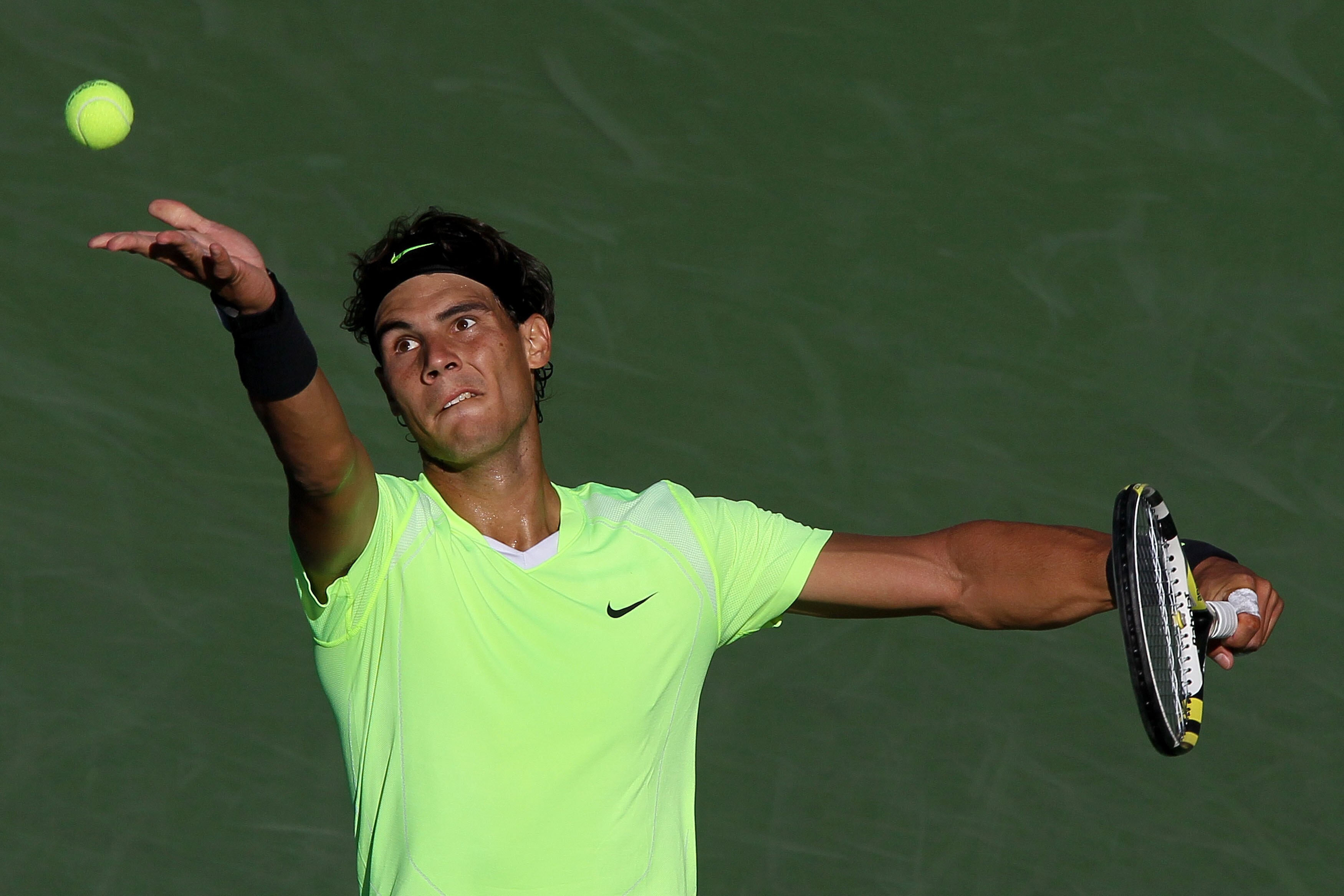 NEW YORK - SEPTEMBER 05:  Rafael Nadal of Spain serves against Gilles Simon of France during the men's singles match on day seven of the 2010 U.S. Open at the USTA Billie Jean King National Tennis Center on September 5, 2010 in the Flushing neighborhood o