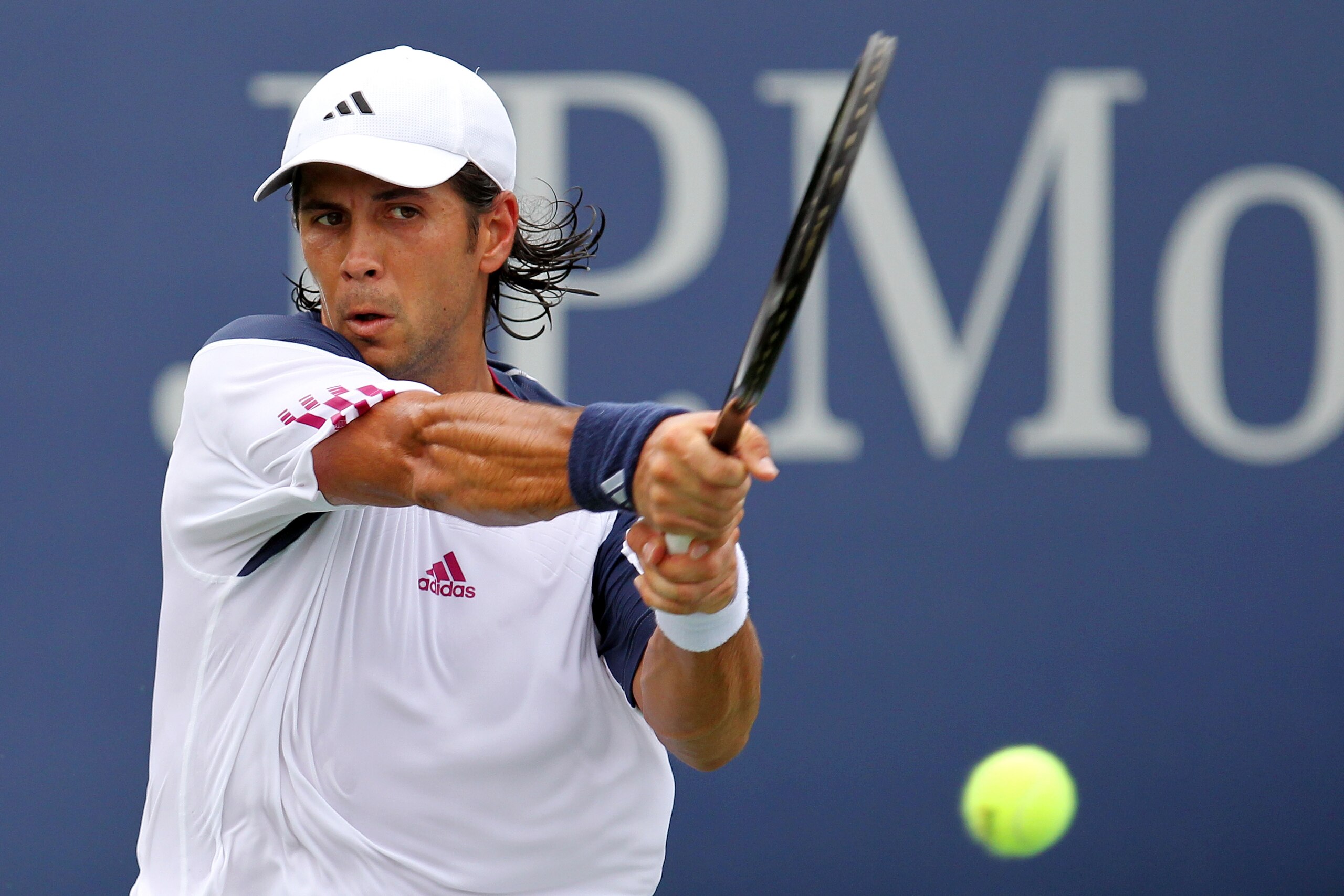 NEW YORK - SEPTEMBER 03:  Fernando Verdasco of Spain returns a shot against Adrian Mannarino of France during his men's singles match on day five of the 2010 U.S. Open at the USTA Billie Jean King National Tennis Center on September 3, 2010 in the Flushin
