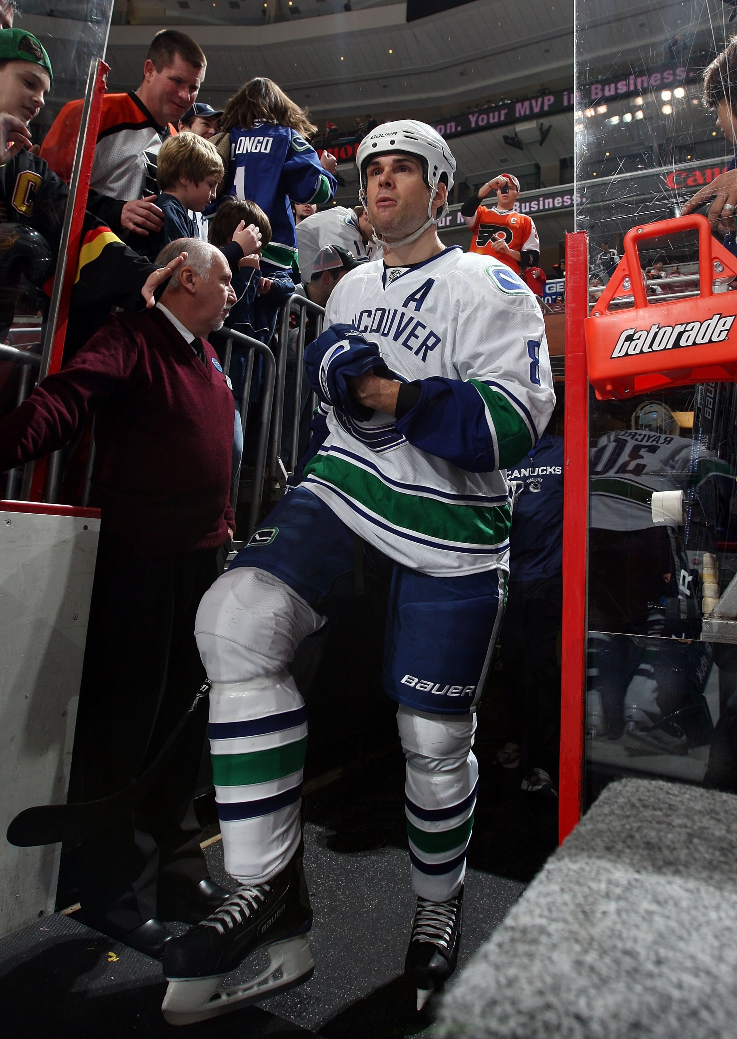 PHILADELPHIA - DECEMBER 03:  Willie Mitchell #8 of the Vancouver Canucks takes the ice to warm up before playing against the Philadelphia Flyers on December 3, 2009 at Wachovia Center in Philadelphia, Pennsylvania.  (Photo by Jim McIsaac/Getty Images)