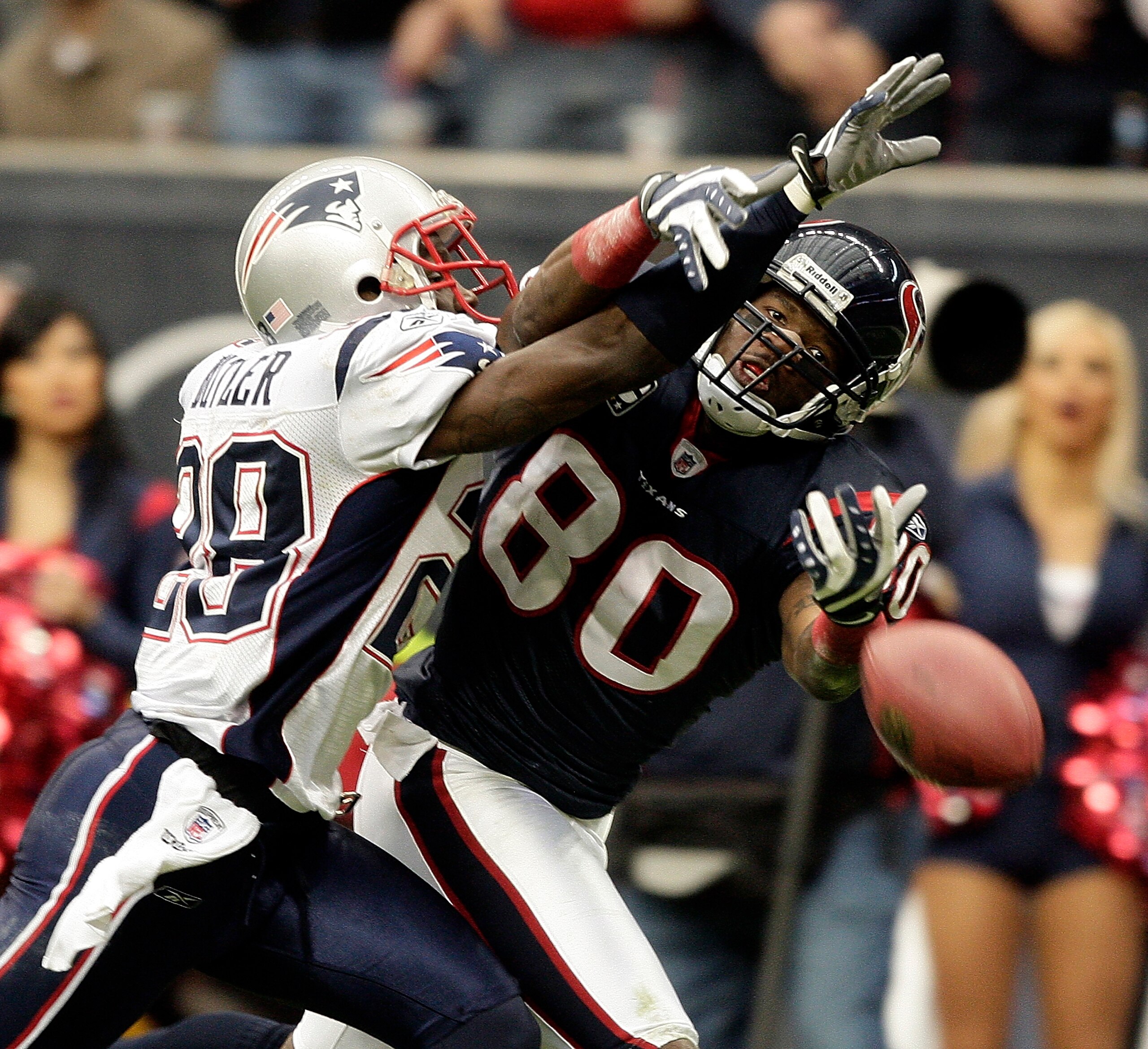 HOUSTON - JANUARY 03:  Cornerback Darius Butler #28 of the New England Patriots breaks up a pass intended for wide receiver Andre Johnson #80 of the Houston Texans at Reliant Stadium on January 3, 2010 in Houston, Texas.  (Photo by Bob Levey/Getty Images)