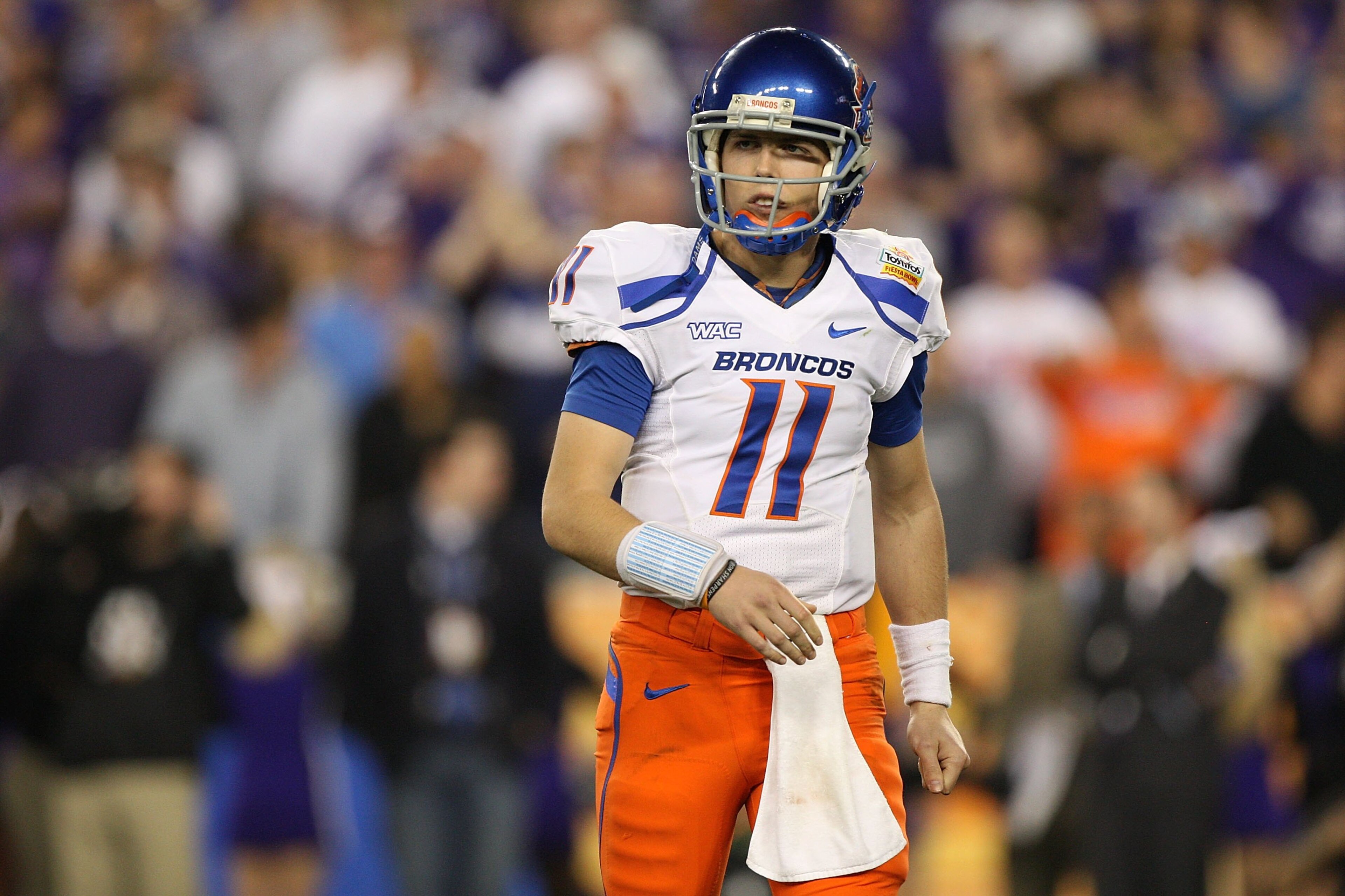 GLENDALE, AZ - JANUARY 04: Quarterback Kellen Moore #11 of the Boise State Broncos looks over to his sideline in the second half against the TCU Horned Frogs during the Tostitos Fiesta Bowl at the Universtity of Phoenix Stadium on January 4, 2010 in Glen GLENDALE, AZ - JANUARY 04: Quarterback Kellen Moore #11 of the Boise State Broncos looks over to his sideline in the second half against the TCU Horned Frogs during the Tostitos Fiesta Bowl at the Universtity of Phoenix Stadium on January 4, 2010 in Glen