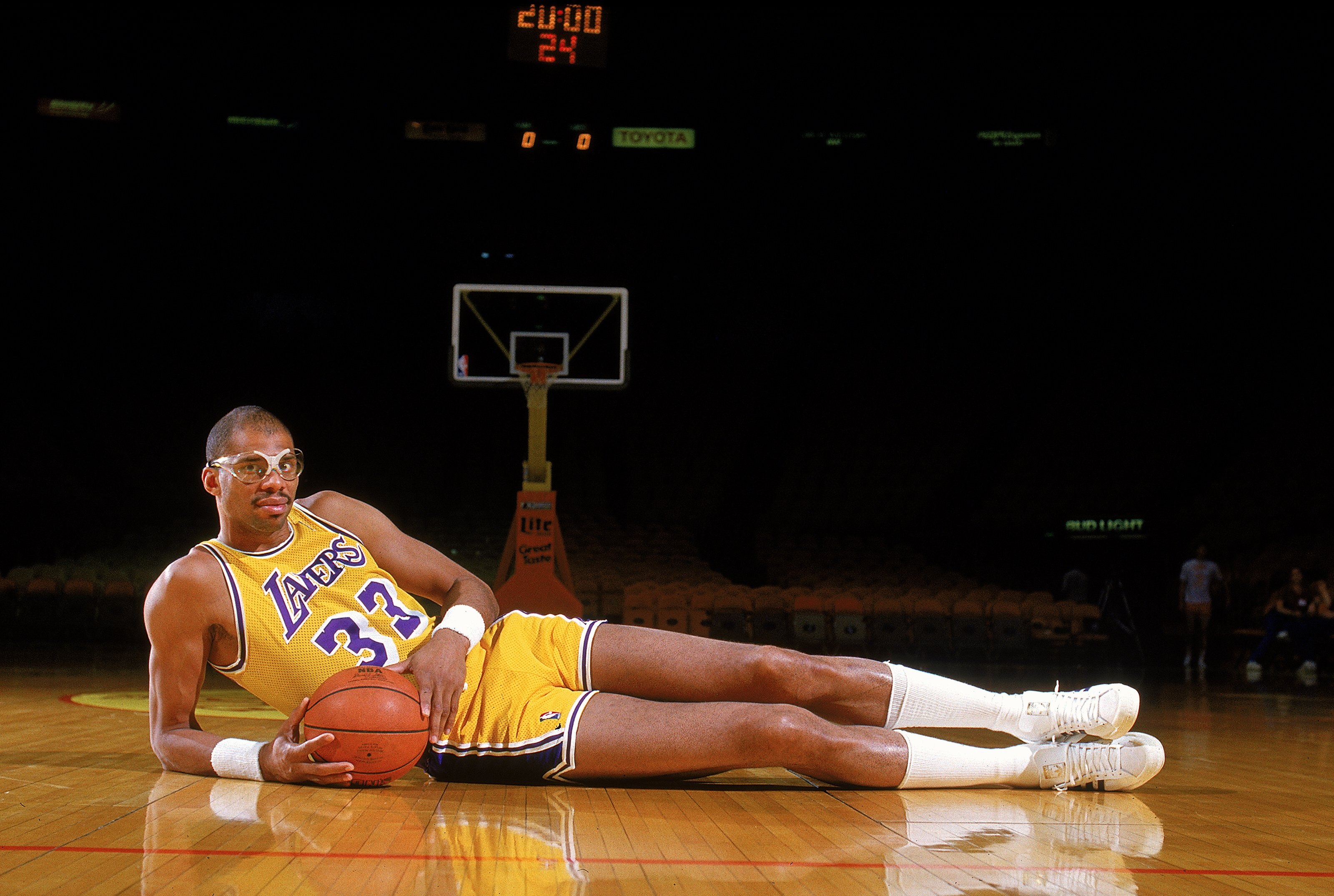 Undated: Kareem Abdul- Jabbar of the Los Angeles Lakers poses for the camera as he lays on the court.  Mandatory Credit: Rick Stewart  /Allsport
