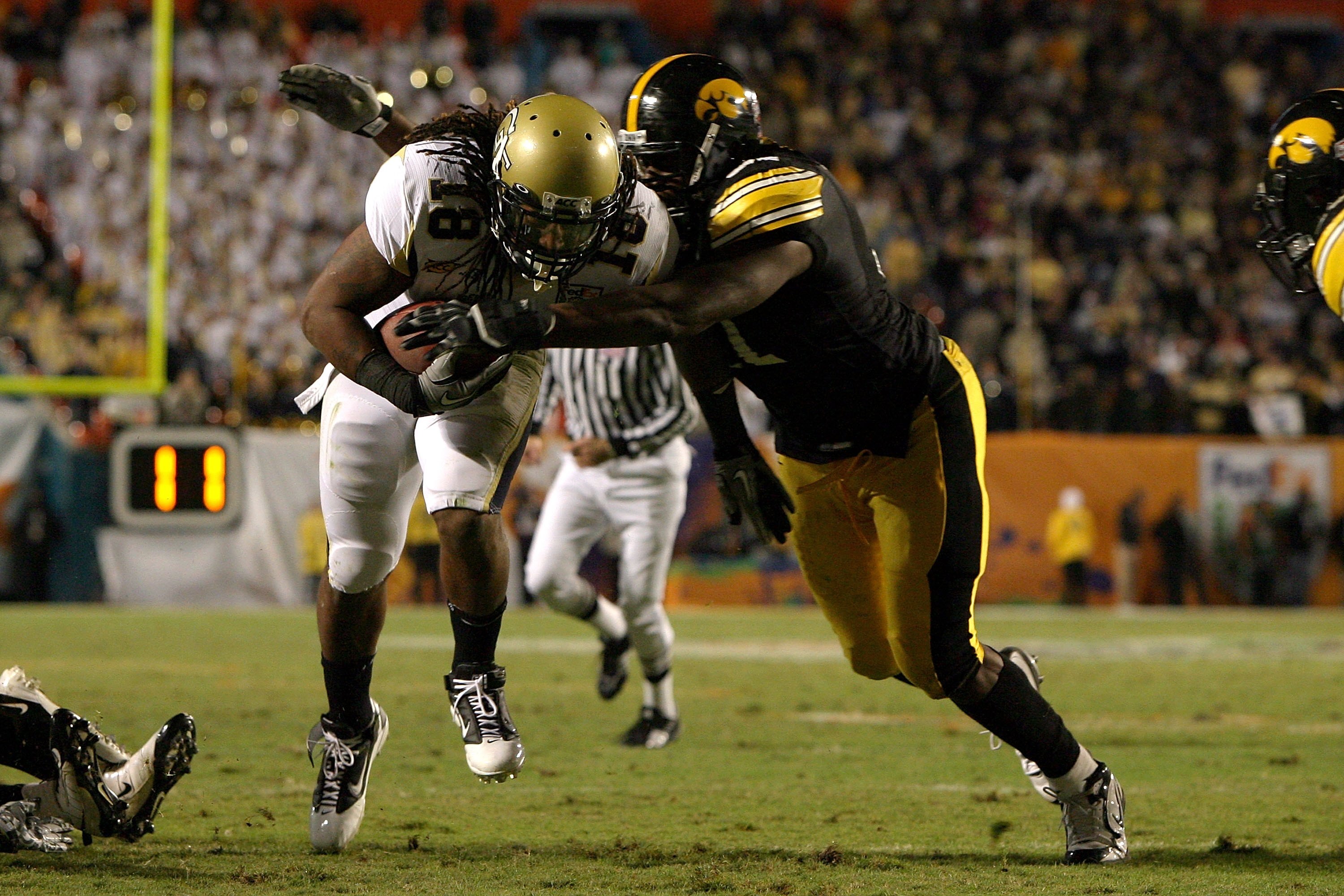 MIAMI GARDENS, FL - JANUARY 05: Anthony Allen #18 of the Georgia Tech Yellow Jackets runs with the ball against the Iowa Hawkeyes during the FedEx Orange Bowl at Land Shark Stadium on January 5, 2010 in Miami Gardens, Florida. Iowa won 24-14. (Photo by D MIAMI GARDENS, FL - JANUARY 05: Anthony Allen #18 of the Georgia Tech Yellow Jackets runs with the ball against the Iowa Hawkeyes during the FedEx Orange Bowl at Land Shark Stadium on January 5, 2010 in Miami Gardens, Florida. Iowa won 24-14. (Photo by D