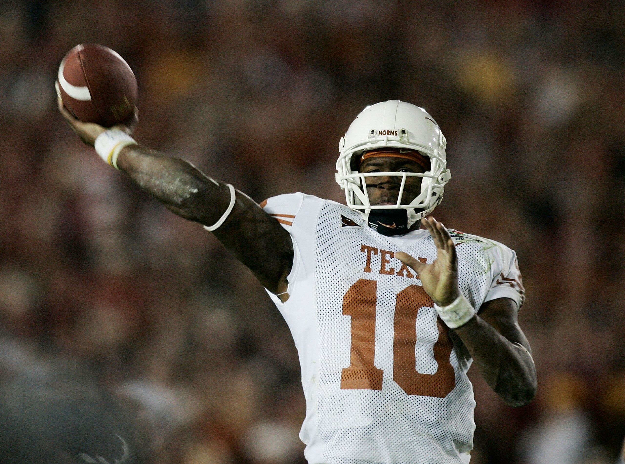PASADENA, CA - JANUARY 04: Quarterback Vince Young #10 of the Texas Longhorns throws the football against the USC Trojans in the third quarter during the BCS National Championship Rose Bowl Game on January 4, 2006 in Pasadena, California. (Photo by Dona PASADENA, CA - JANUARY 04: Quarterback Vince Young #10 of the Texas Longhorns throws the football against the USC Trojans in the third quarter during the BCS National Championship Rose Bowl Game on January 4, 2006 in Pasadena, California. (Photo by Dona