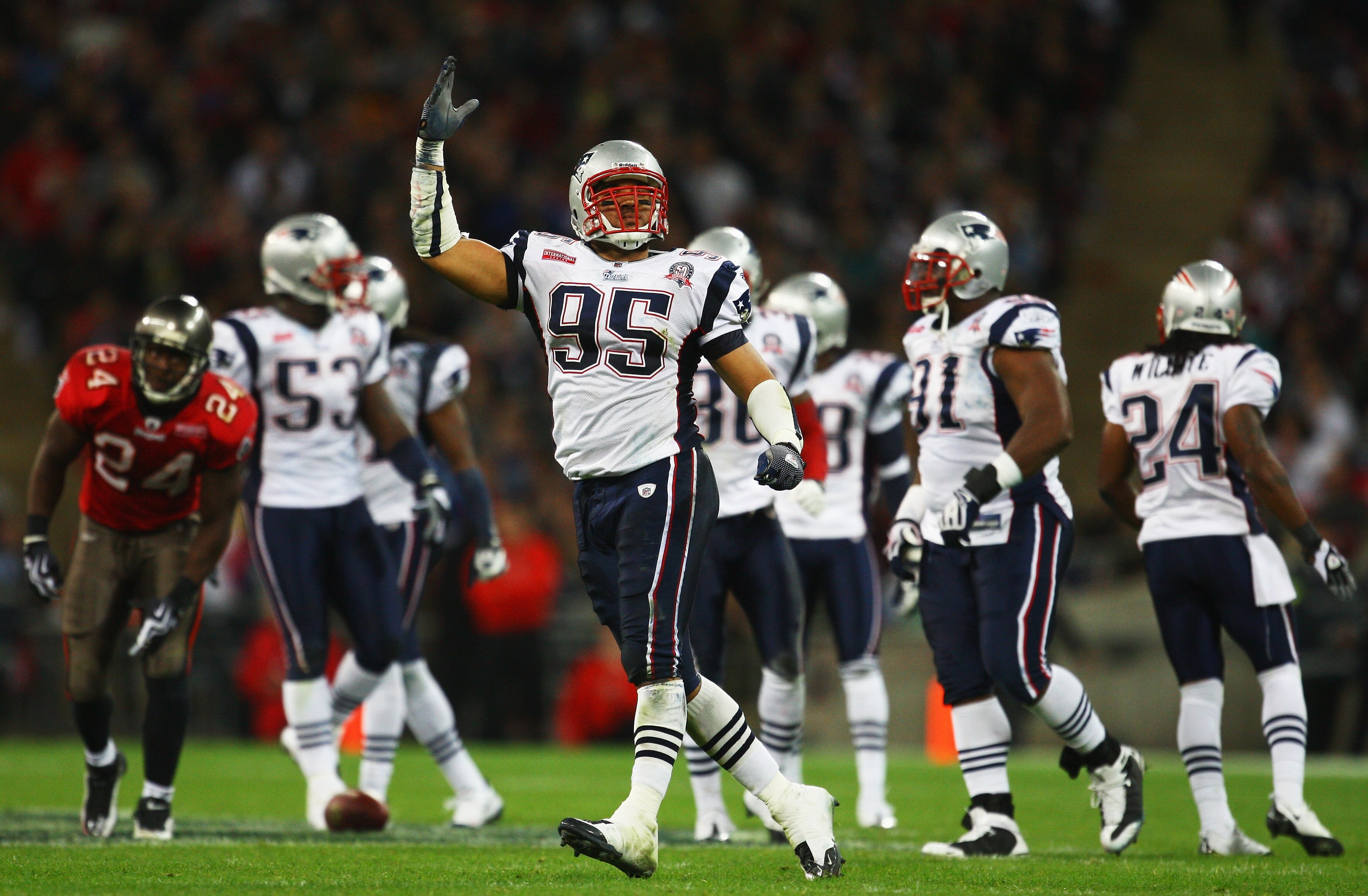 LONDON, ENGLAND - OCTOBER 25:  Tully Banta-Cain (#95) of the New England Patriots celebrates during the NFL International Series match between New England Patriots and Tampa Bay Buccaneers at Wembley Stadium on October 25, 2009 in London, England. This is