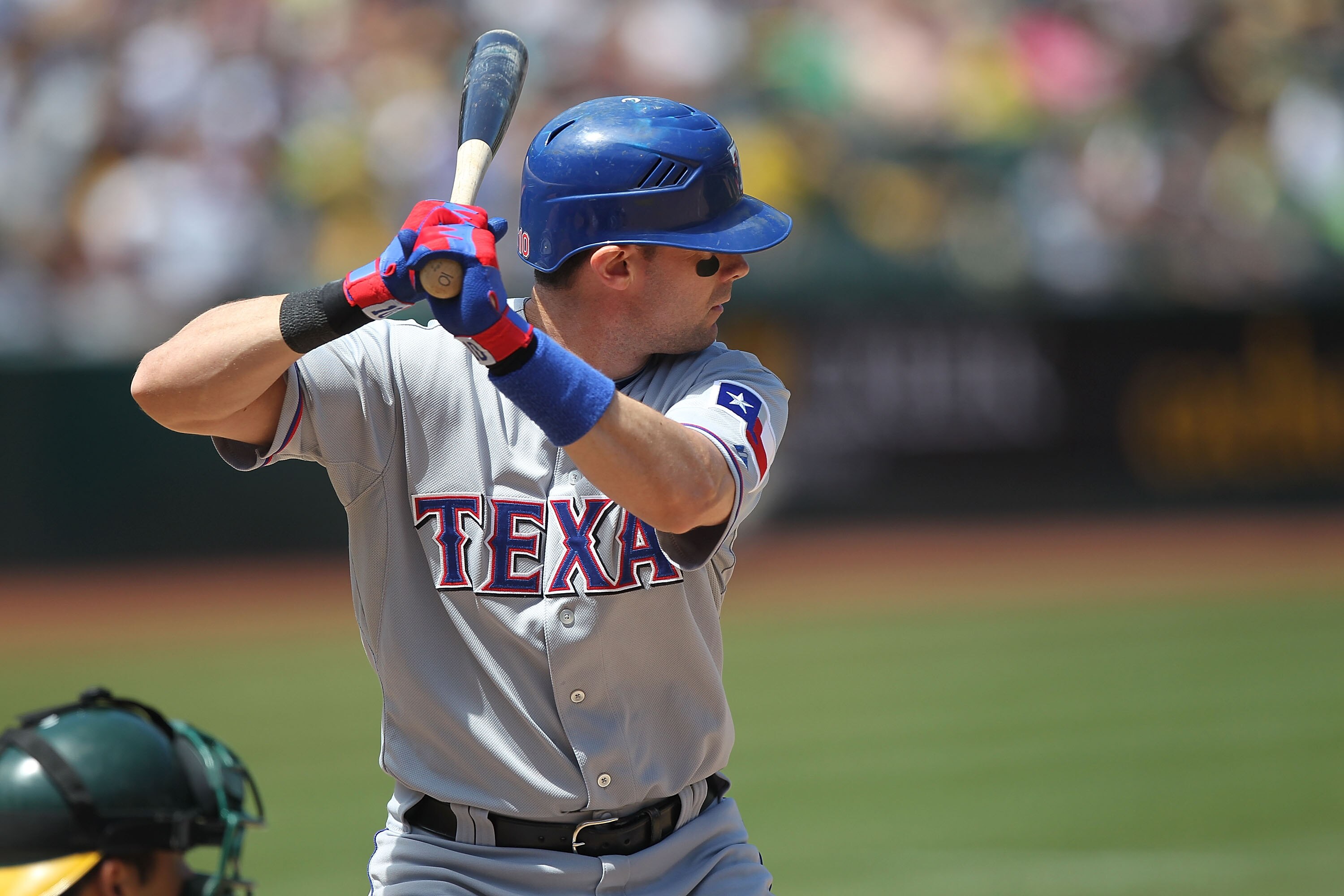OAKLAND, CA - AUGUST 08:  Michael Young #10 of the Texas Rangers in action against the Oakland Athletics during an MLB game at the Oakland-Alameda County Coliseum on August 8, 2010 in Oakland, California.  (Photo by Jed Jacobsohn/Getty Images)