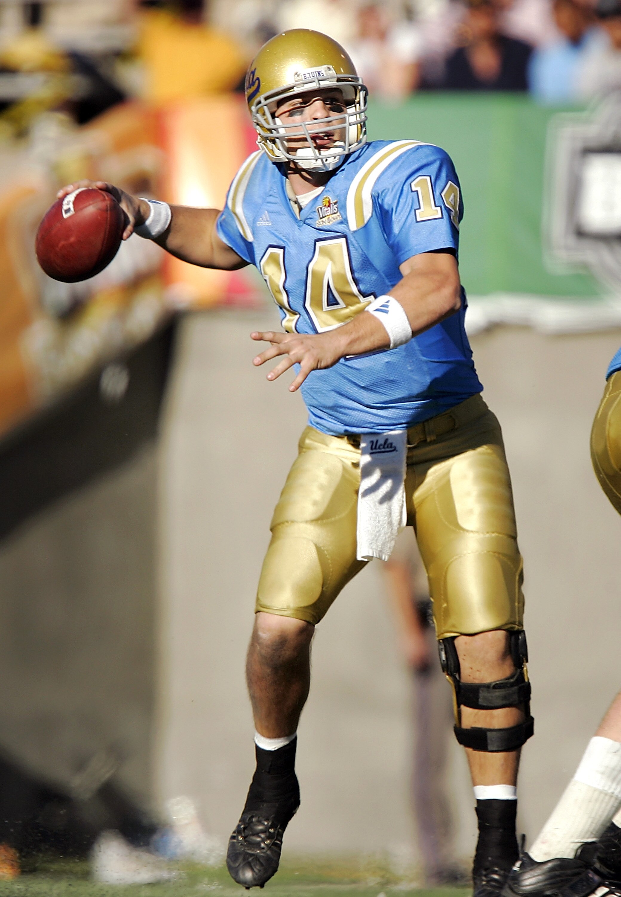 EL PASO, TX - DECEMBER 30: Quarterback Drew Olson #14 of the UCLA Bruins throws against the Northwestern Wildcats in the third quarter during the Vitalis Sun Bowl on December 30, 2005 at the Sun Bowl in El Paso, Texas. The Bruins defeated the Wildcats 50 EL PASO, TX - DECEMBER 30: Quarterback Drew Olson #14 of the UCLA Bruins throws against the Northwestern Wildcats in the third quarter during the Vitalis Sun Bowl on December 30, 2005 at the Sun Bowl in El Paso, Texas. The Bruins defeated the Wildcats 50