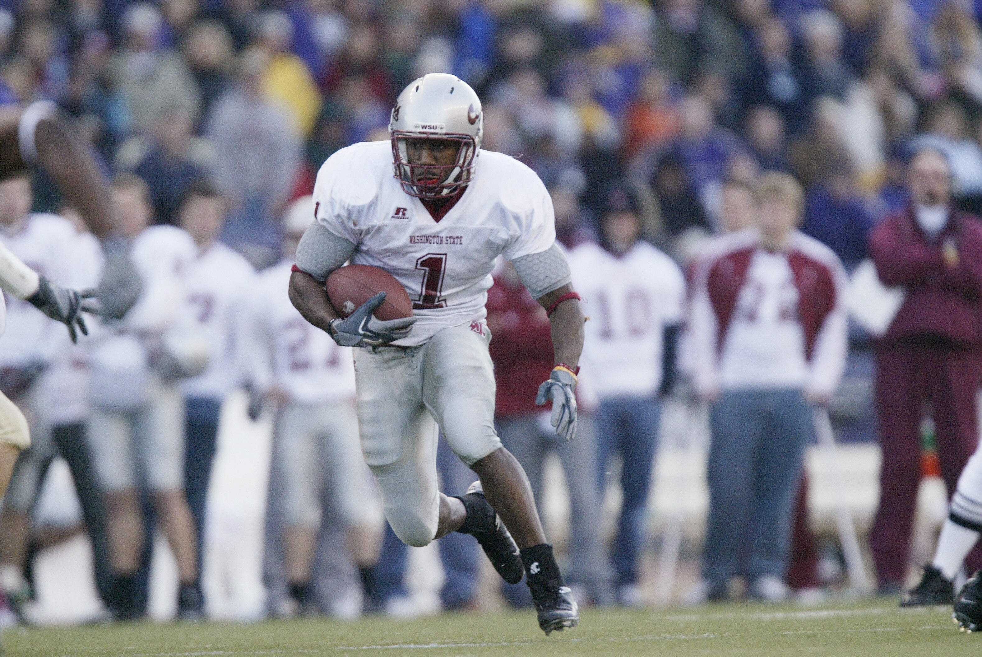 SEATTLE - NOVEMBER 19: Running back Jerome Harrison #1 of the Washington State Cougars carries the ball against the Washington Huskies at Husky Stadium on November 19, 2005 in Seattle Washington. The Cougars defeated the Huskies 26-22. (Photo by Otto Gr SEATTLE - NOVEMBER 19: Running back Jerome Harrison #1 of the Washington State Cougars carries the ball against the Washington Huskies at Husky Stadium on November 19, 2005 in Seattle Washington. The Cougars defeated the Huskies 26-22. (Photo by Otto Gr