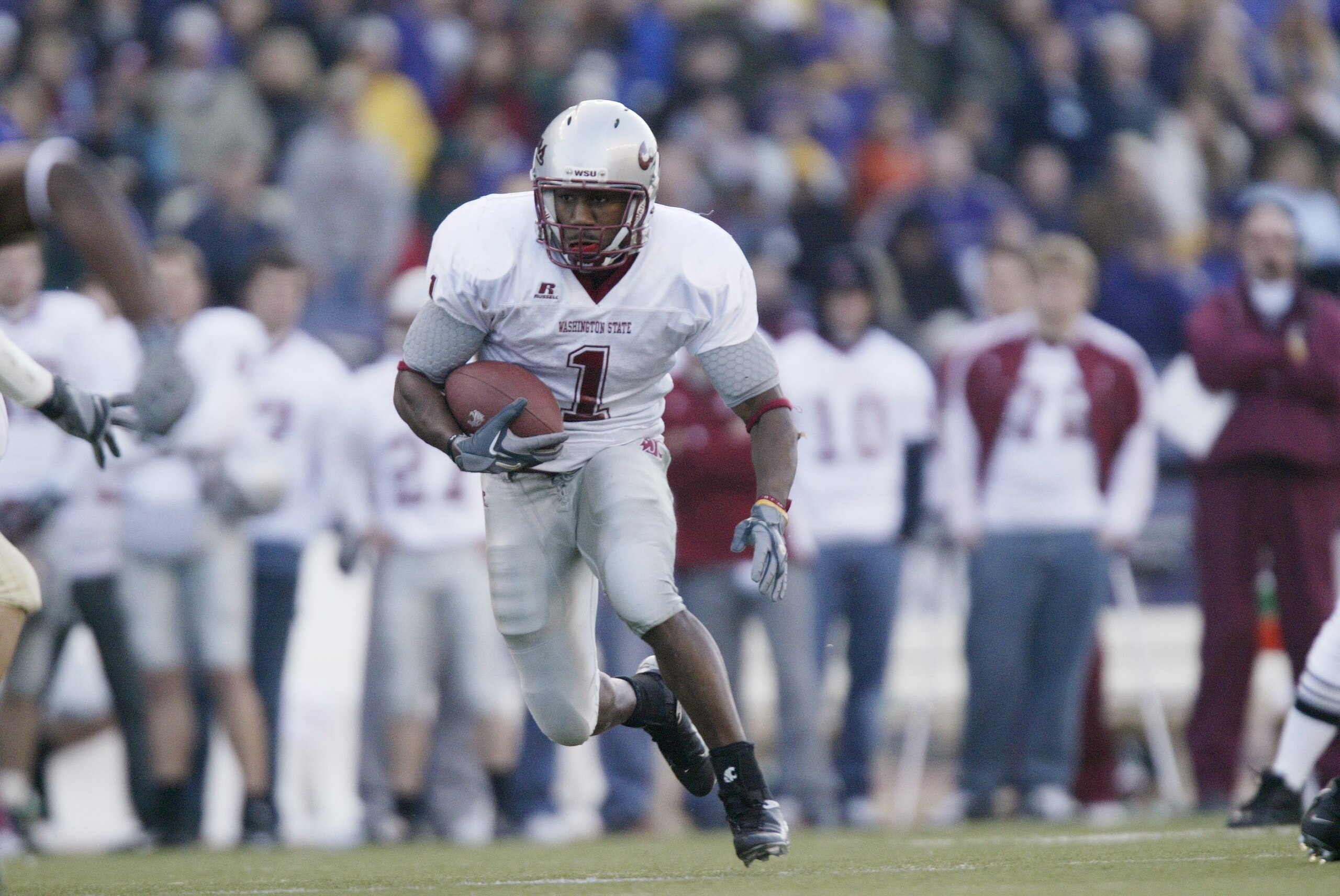SEATTLE - NOVEMBER 19: Running back Jerome Harrison #1 of the Washington State Cougars carries the ball against the Washington Huskies at Husky Stadium on November 19, 2005 in Seattle Washington. The Cougars defeated the Huskies 26-22. (Photo by Otto Gr SEATTLE - NOVEMBER 19: Running back Jerome Harrison #1 of the Washington State Cougars carries the ball against the Washington Huskies at Husky Stadium on November 19, 2005 in Seattle Washington. The Cougars defeated the Huskies 26-22. (Photo by Otto Gr