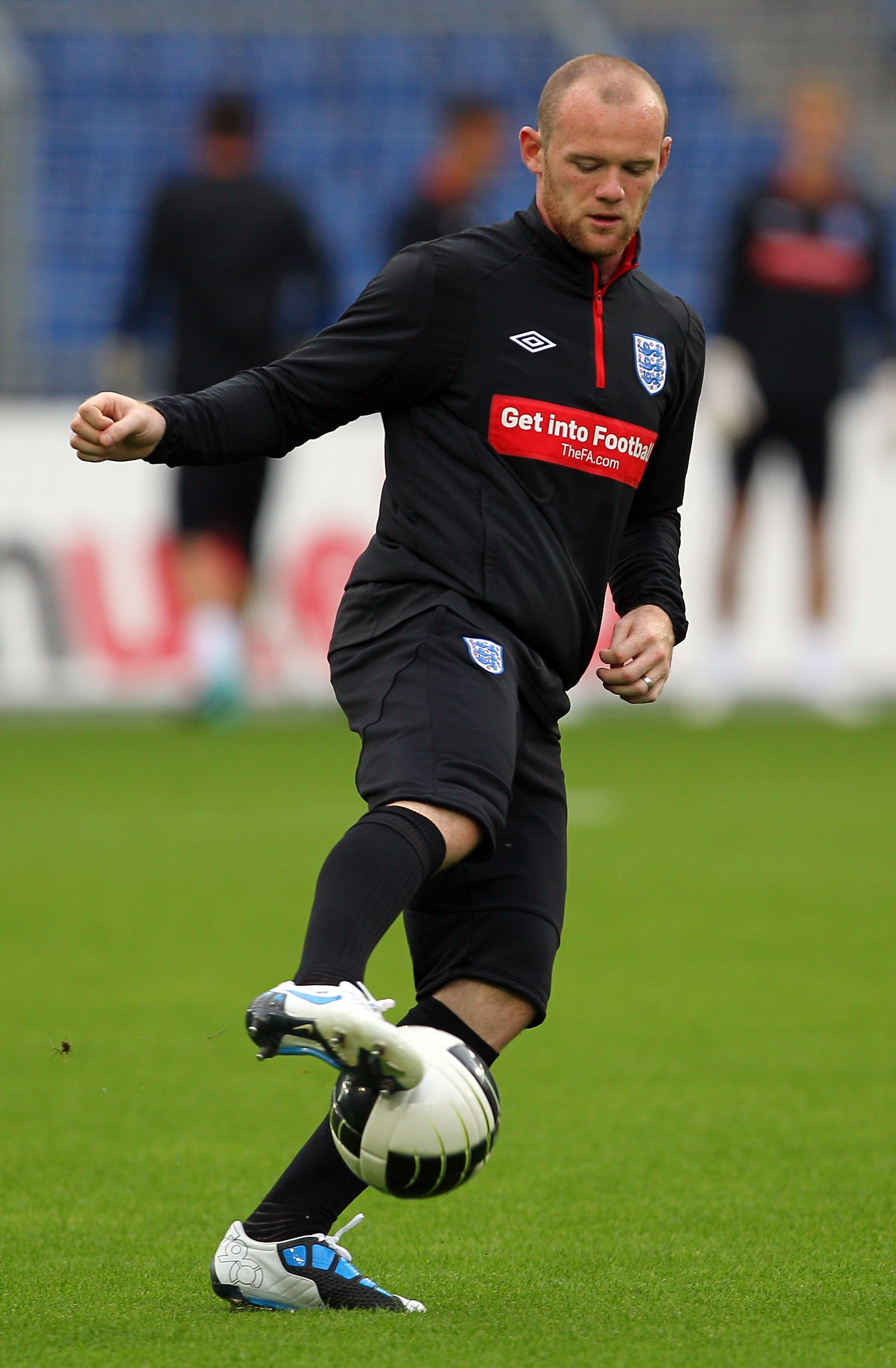 BASEL, SWITZERLAND - SEPTEMBER 06:  Wayne Rooney of England in action during the England training session ahead of their UEFA EURO 2012 qualifying match against Switzerland, at the St Jacob Stadium on September 6, 2010 in Basel, Switzerland.  (Photo by Cl