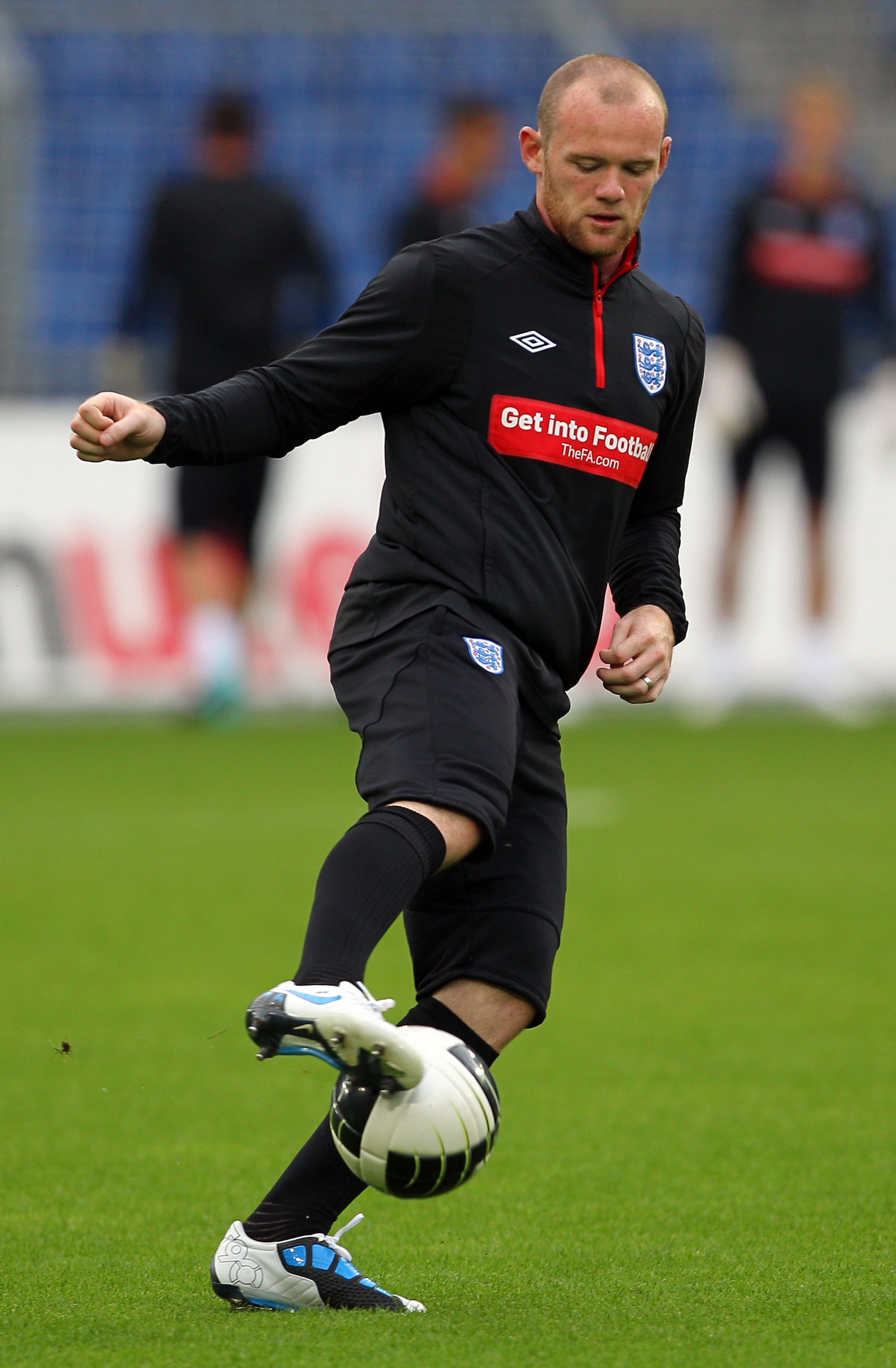 BASEL, SWITZERLAND - SEPTEMBER 06:  Wayne Rooney of England in action during the England training session ahead of their UEFA EURO 2012 qualifying match against Switzerland, at the St Jacob Stadium on September 6, 2010 in Basel, Switzerland.  (Photo by Cl