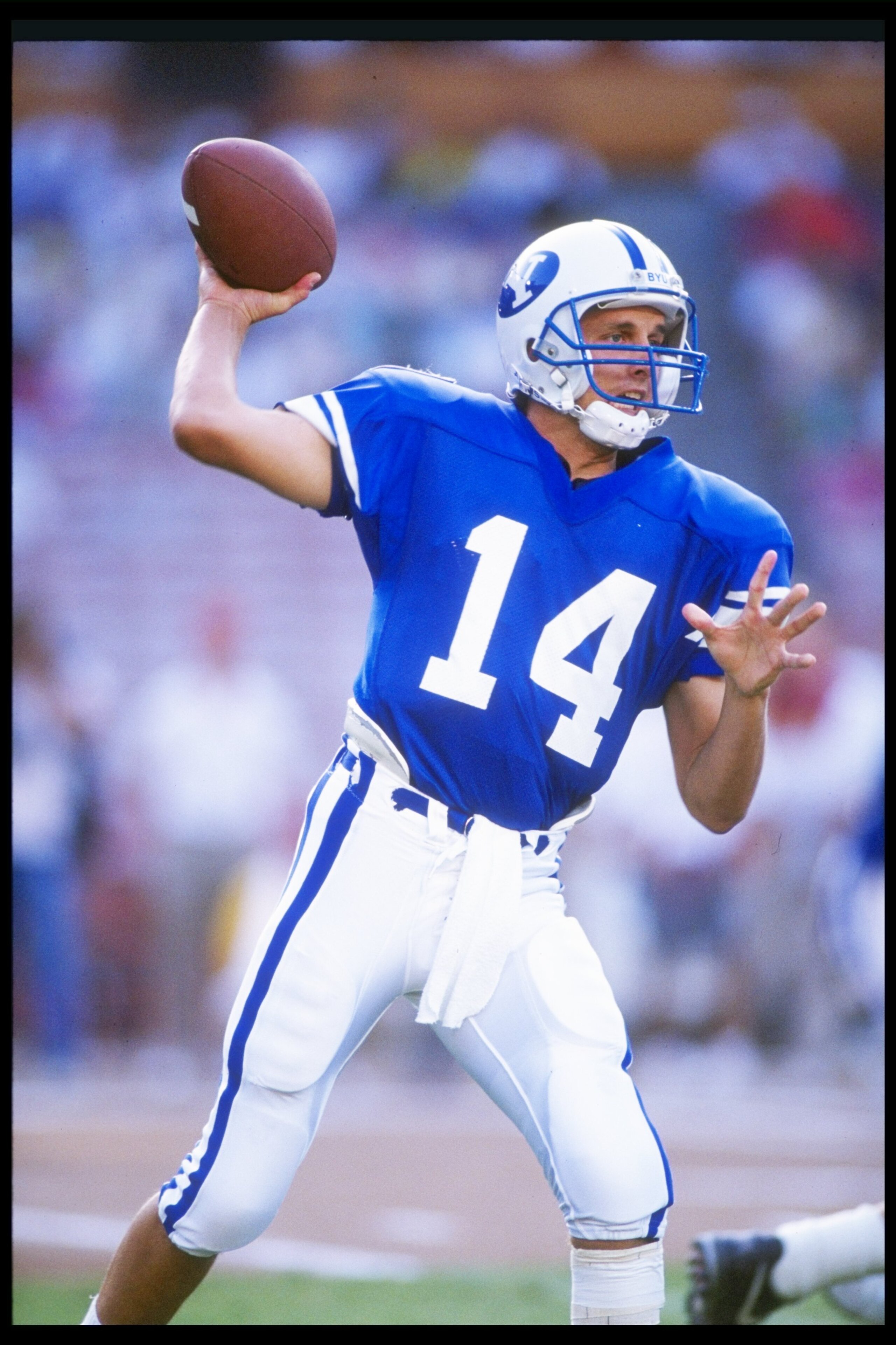 29 Aug 1991:  Quarterback Ty Detmer of the Brigham Young Cougars throws a pass during a game against the Florida State Seminoles at the Pigskin Classic at Anaheim Stadium in Anaheim, California.  Florida State won the game 44-28. Mandatory Credit: Stephen