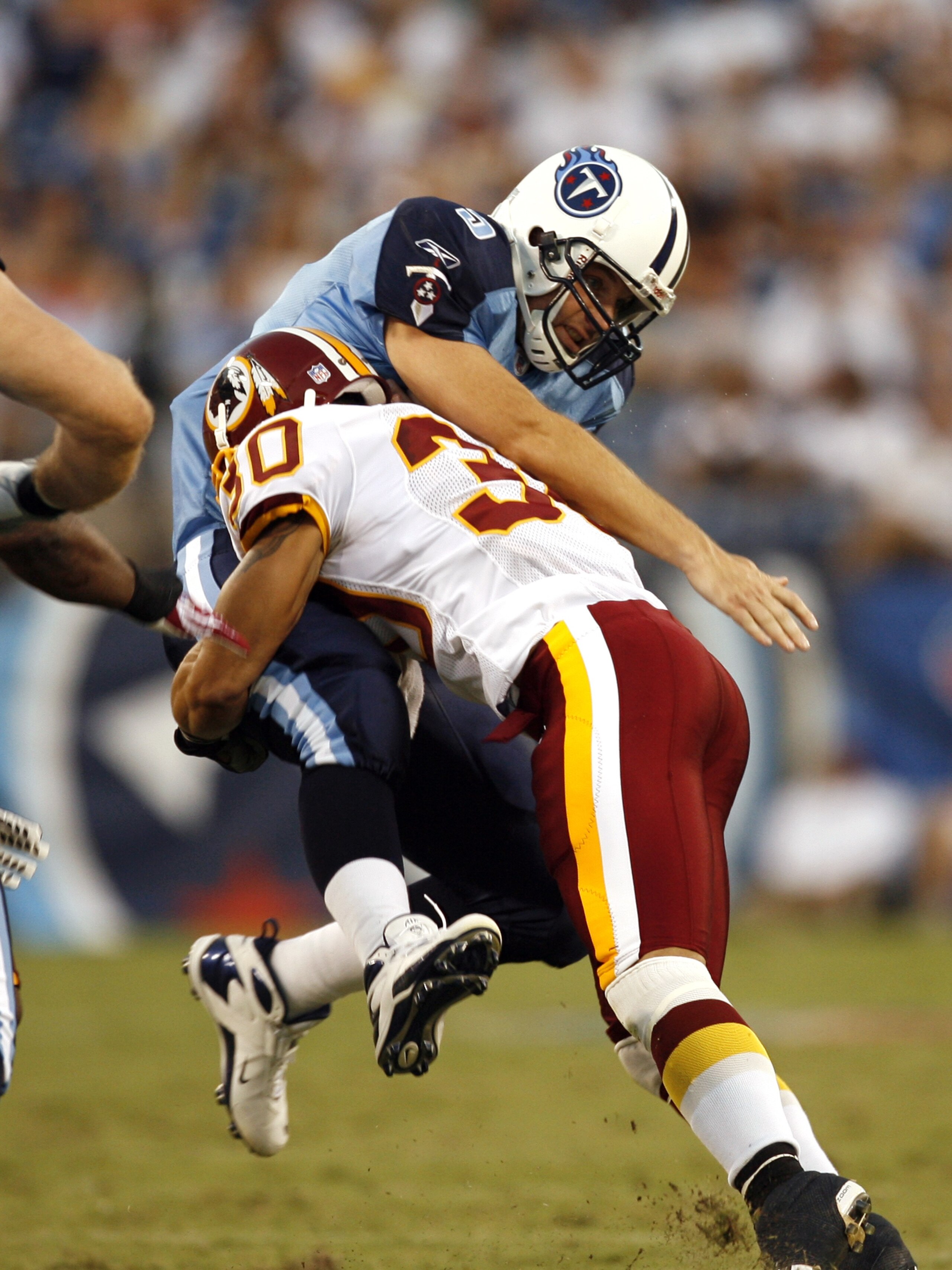 NASHVILLE, TN - AUGUST 11:  LaRon Landry #30 of the Washington Redskins hits Kerry Collins #5 of the Tennessee Titans during a preseason game at LP Field August 11, 2007 in Nashville, Tennessee. (Photo by Joe Murphy/Getty Images)