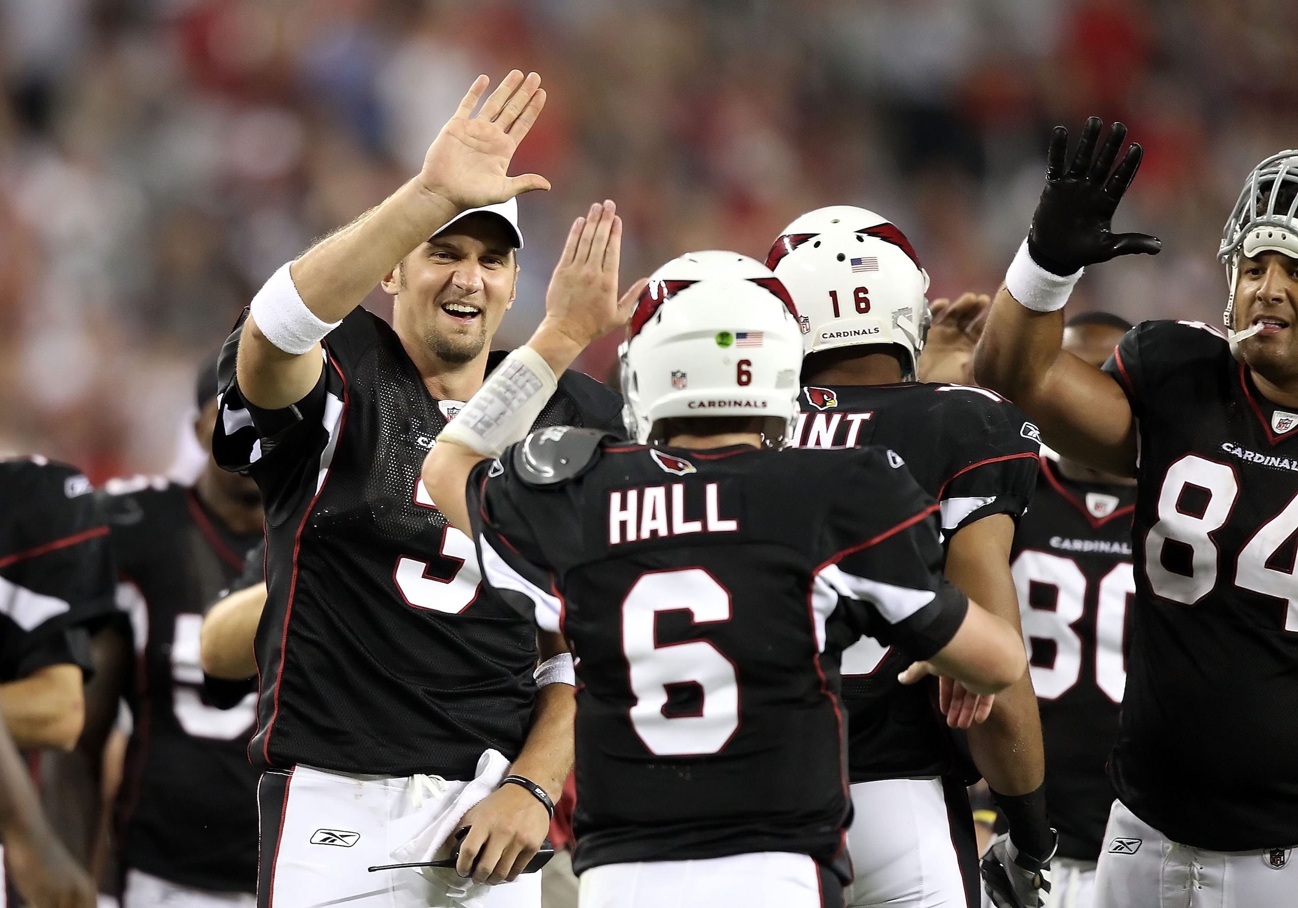 GLENDALE, AZ - SEPTEMBER 02:  Quarterback Derek Anderson #3 of the Arizona Cardinals high fives Max Hall #6 after he scored a touchdown against the Washington Redskins during the preseason NFL game at the University of Phoenix Stadium on September 2, 2010