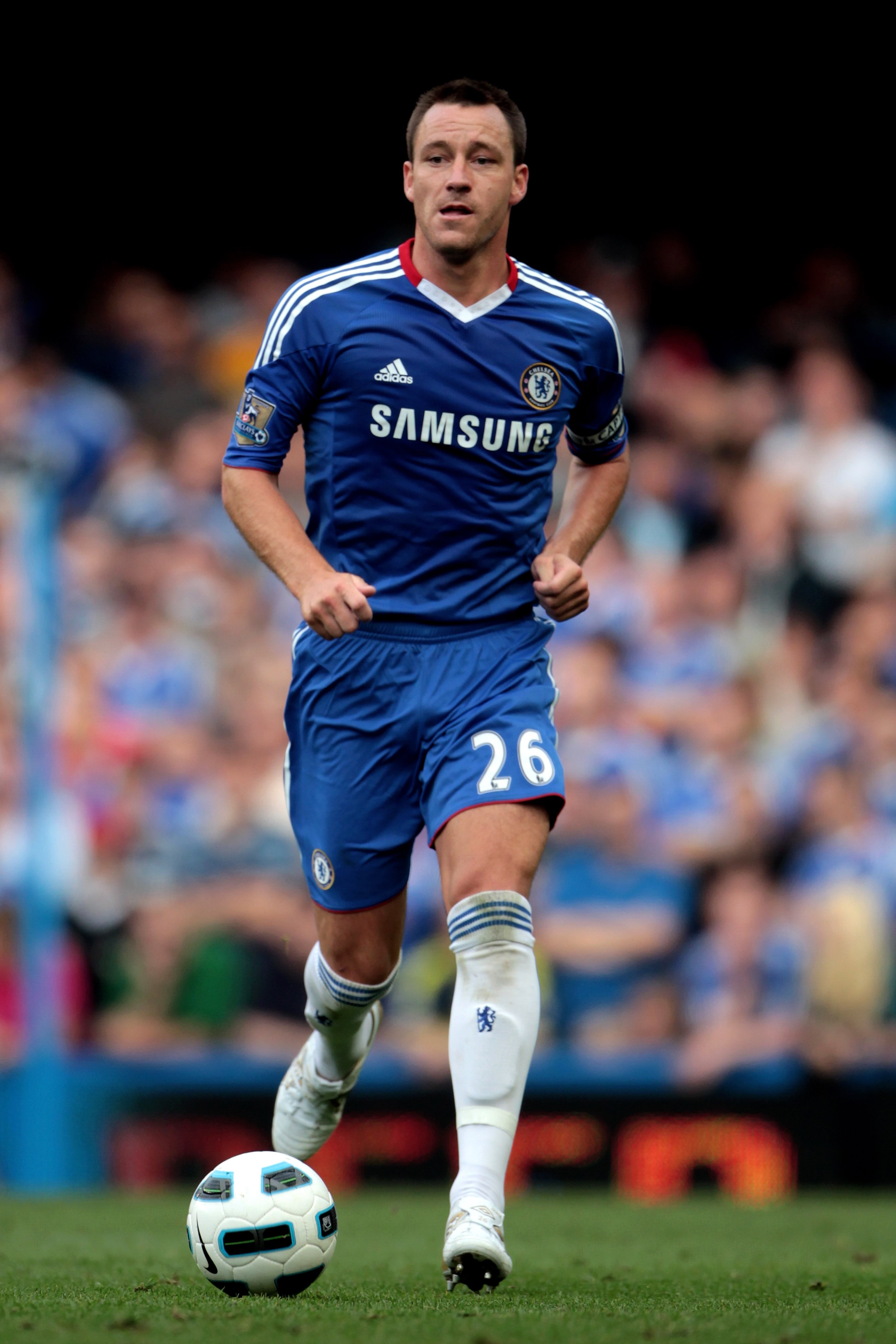 LONDON, ENGLAND - AUGUST 14:  John Terry of Chelsea runs with the ball during the Barclays Premier League match between Chelsea and West Bromwich Albion at Stamford Bridge on August 14, 2010 in London, England.  (Photo by Phil Cole/Getty Images)
