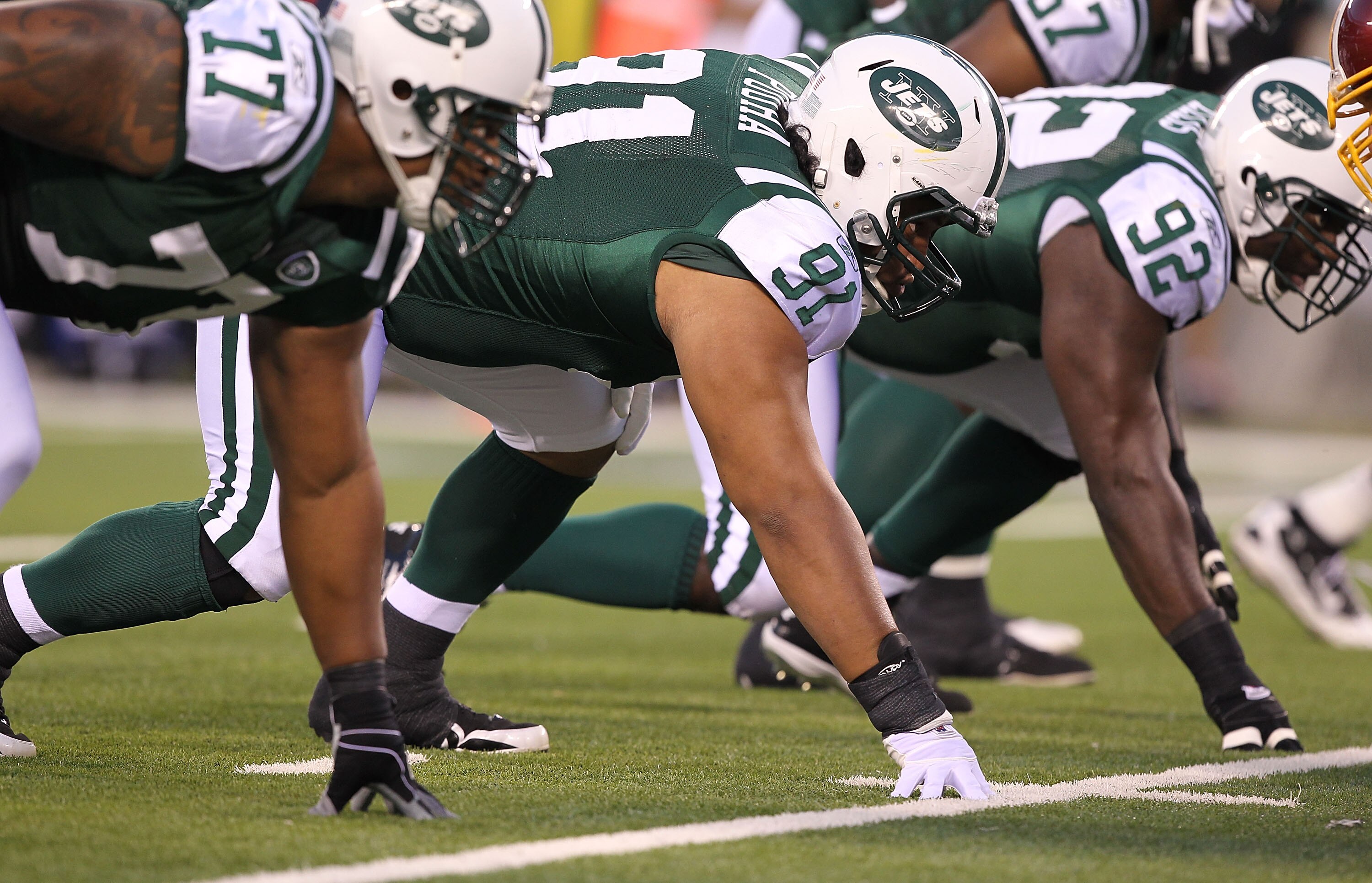 EAST RUTHERFORD, NJ - AUGUST 27: Sione Pouha #91 of the New York Jets in action against the Washington Redskins  during their preseason game on August 27, 2010 at the New Meadowlands Stadium  in East Rutherford, New Jersey.  (Photo by Al Bello/Getty Image