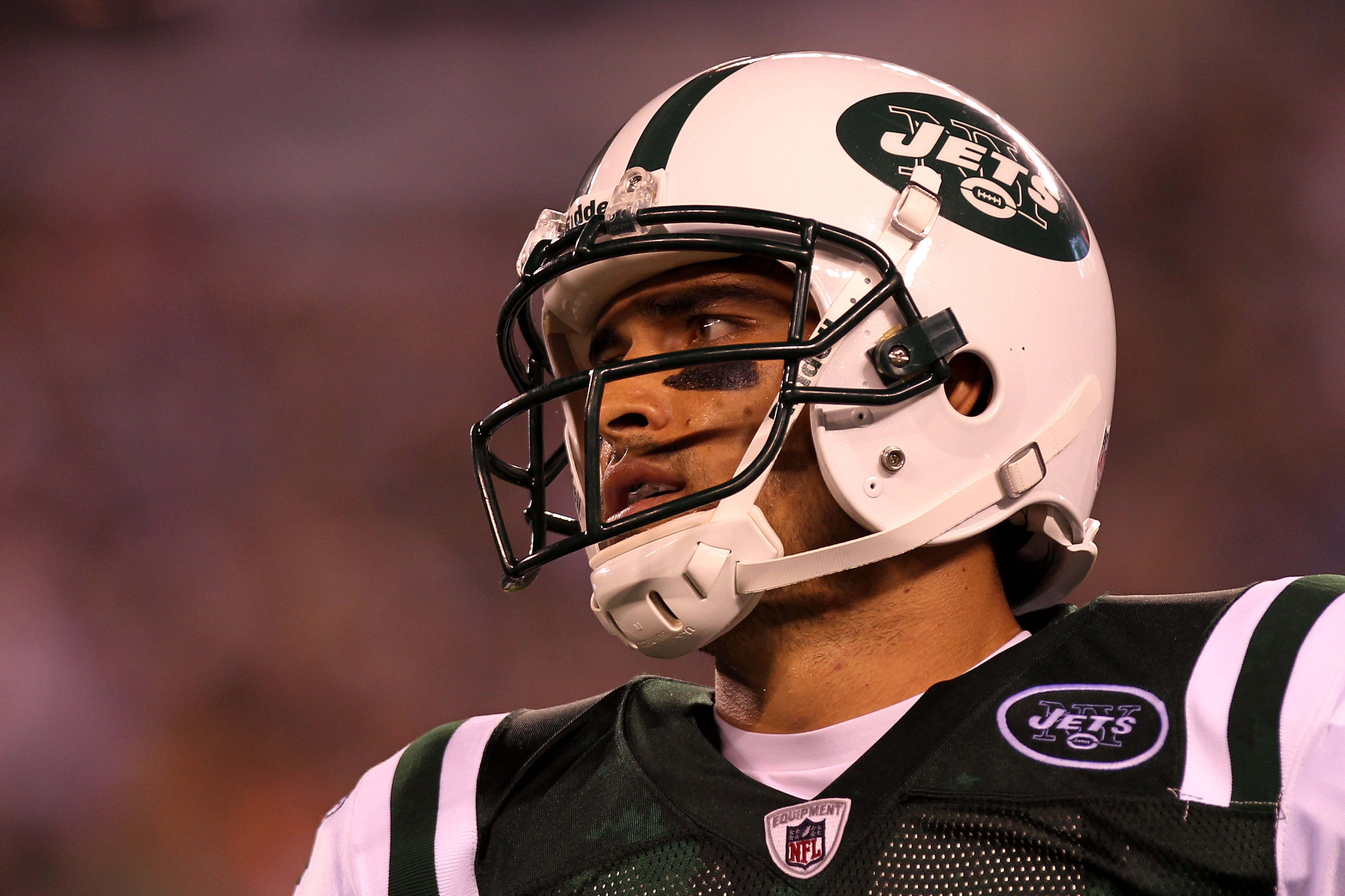 EAST RUTHERFORD, NJ - AUGUST 16:  Quarterback Mark Sanchez #6 of the New York Jets walks off the field against the New York Giants during their game at New Meadowlands Stadium on August 16, 2010 in East Rutherford, New Jersey.  (Photo by Nick Laham/Getty