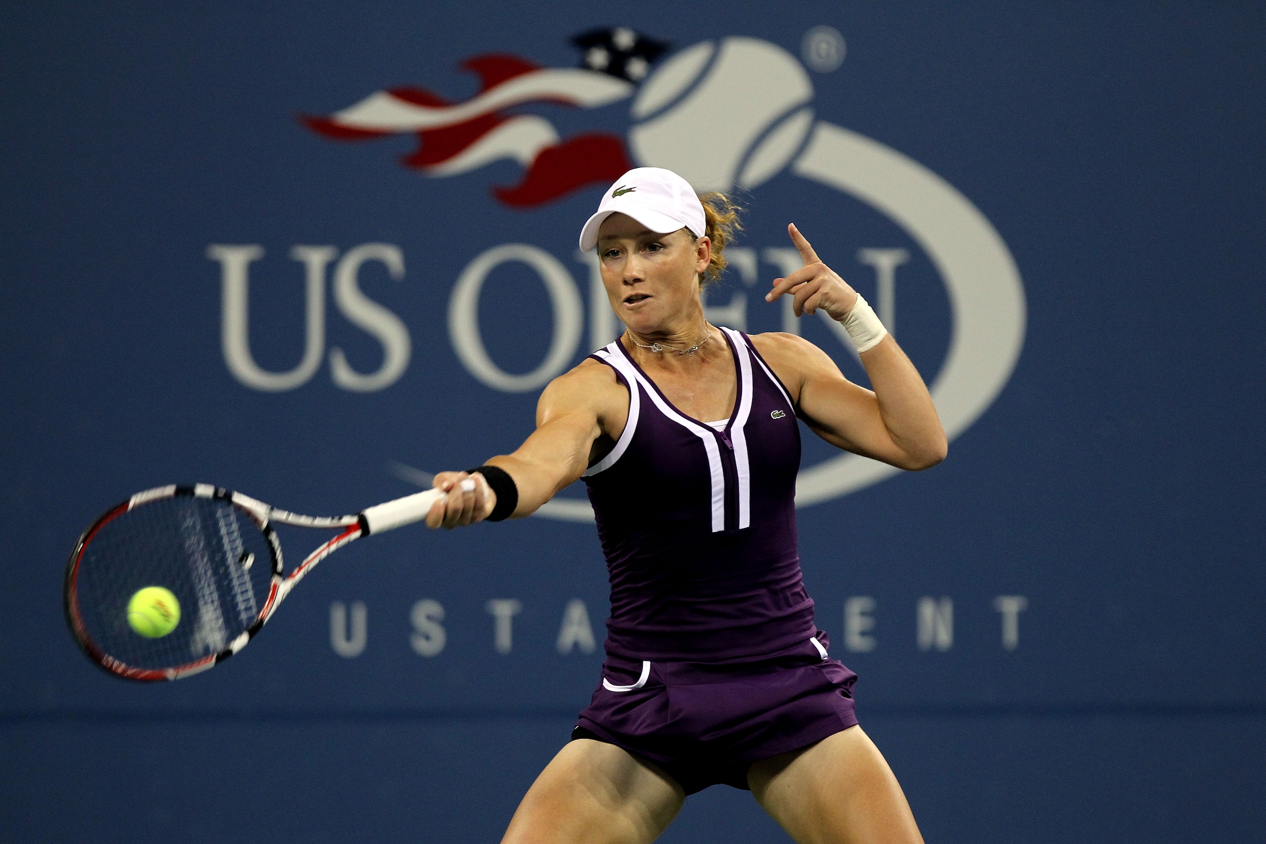 NEW YORK - SEPTEMBER 05: Samantha Stosur of Australia hits a return against Elena Dementieva of Russia during her women's singles match on day seven of the 2010 U.S. Open at the USTA Billie Jean King National Tennis Center on September 5, 2010 in the Flu NEW YORK - SEPTEMBER 05: Samantha Stosur of Australia hits a return against Elena Dementieva of Russia during her women's singles match on day seven of the 2010 U.S. Open at the USTA Billie Jean King National Tennis Center on September 5, 2010 in the Flu