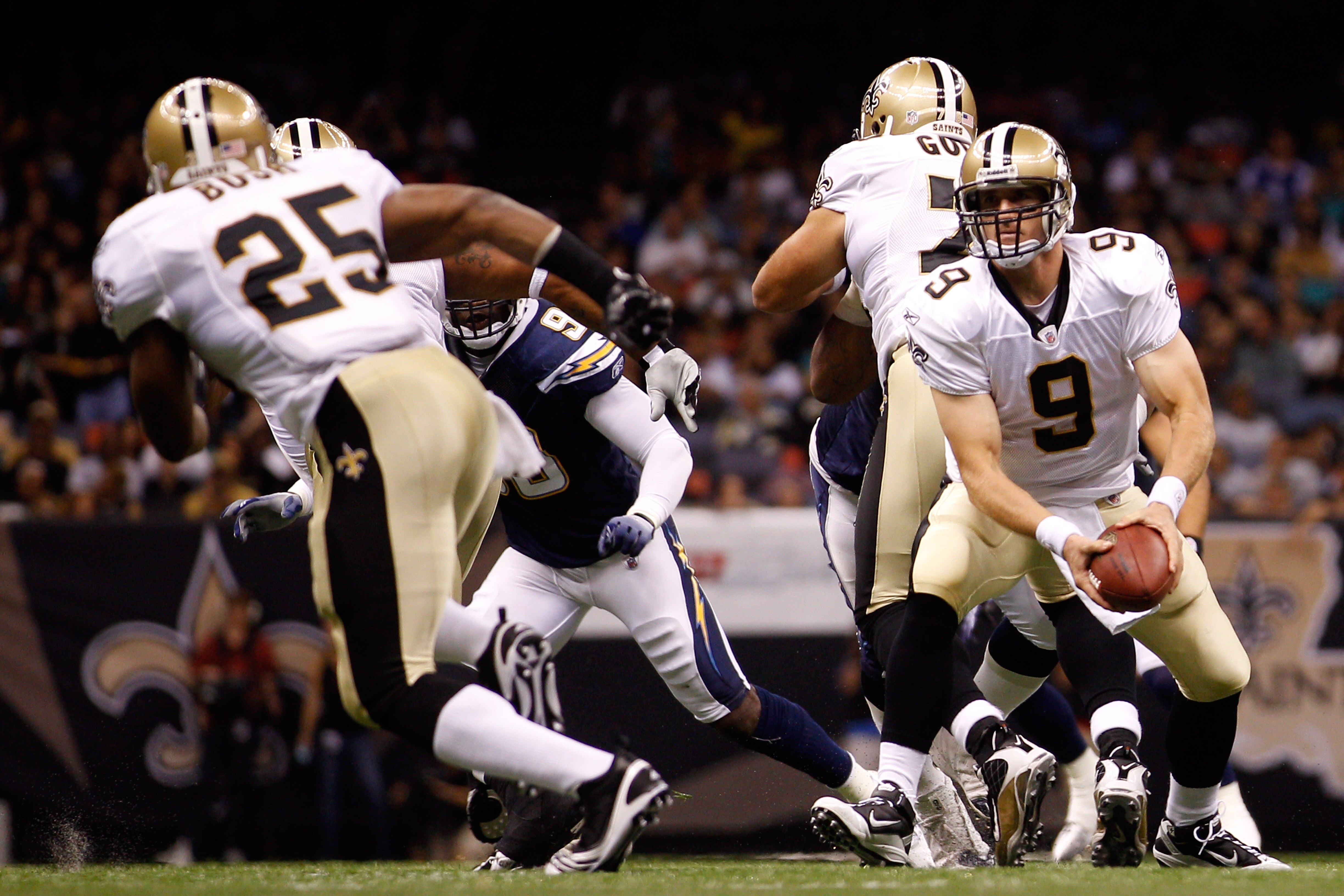 NEW ORLEANS - AUGUST 27:  Drew Brees #9 of the New Orleans Saints in action against the San Diego Chargers at the Louisiana Superdome on August 27, 2010 in New Orleans, Louisiana.  (Photo by Chris Graythen/Getty Images)