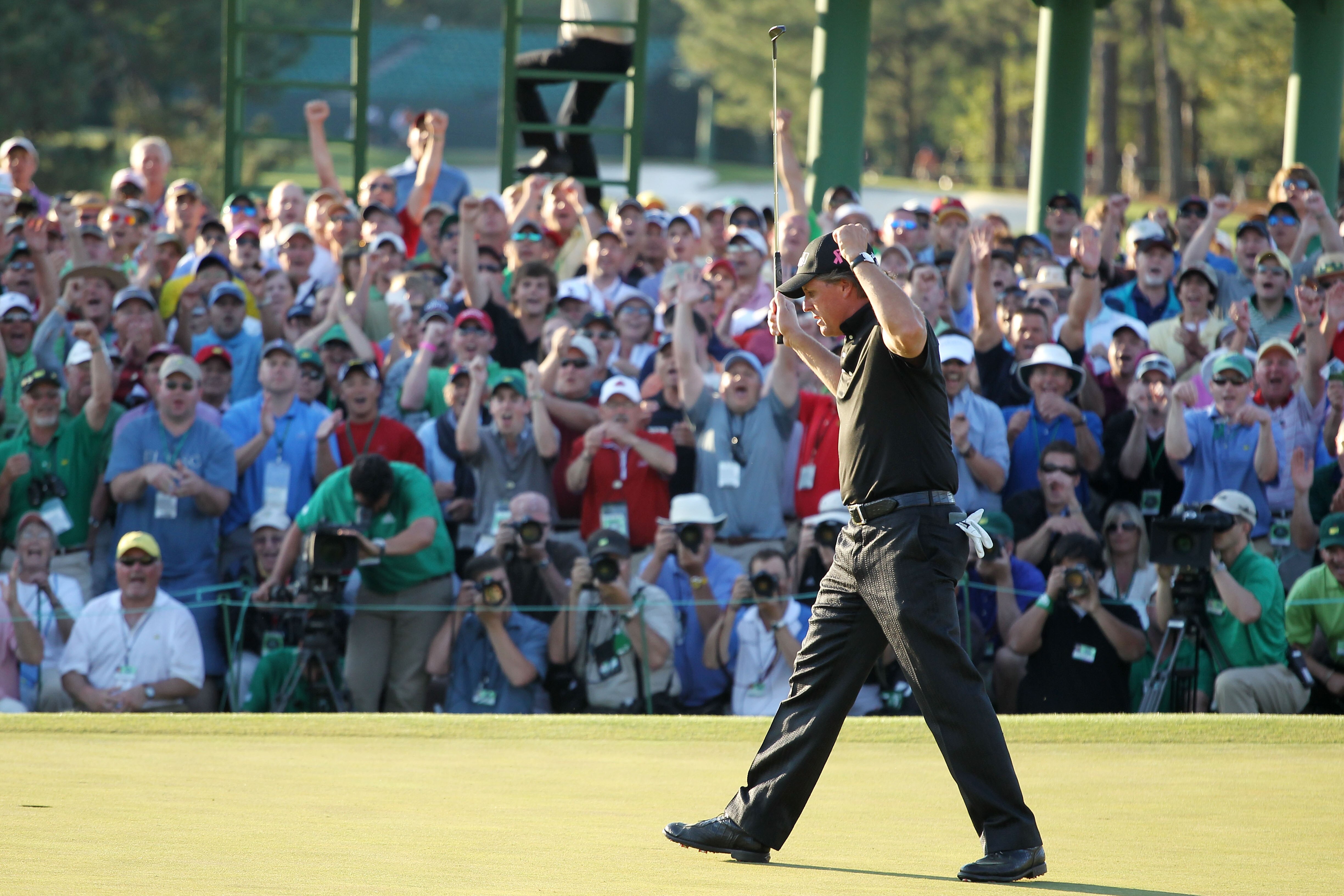 AUGUSTA, GA - APRIL 11:  Phil Mickelson celebrates his three-stroke victory after winning the 2010 Masters Tournament at Augusta National Golf Club on April 11, 2010 in Augusta, Georgia.  (Photo by Jamie Squire/Getty Images)