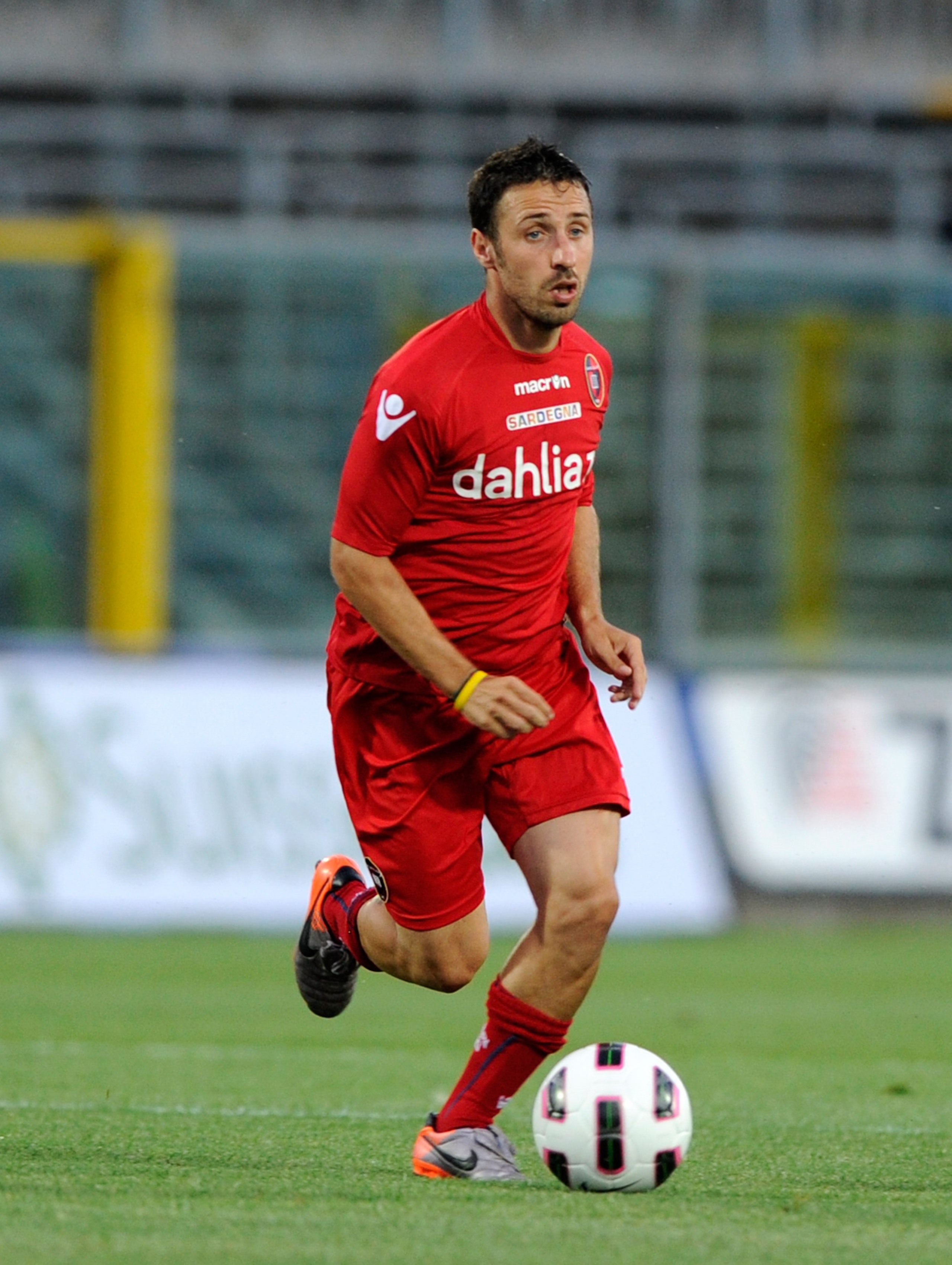 BERGAMO, ITALY - AUGUST 07: Andrea Cossu of Cagliari Calcio during the friendly match between Atalanta and Cagliari at Stadio Atleti Azzurri d'Italia on August 7, 2010 in Bergamo, Italy. (Photo by Claudio Villa/Getty Images) BERGAMO, ITALY - AUGUST 07: Andrea Cossu of Cagliari Calcio during the friendly match between Atalanta and Cagliari at Stadio Atleti Azzurri d'Italia on August 7, 2010 in Bergamo, Italy. (Photo by Claudio Villa/Getty Images)