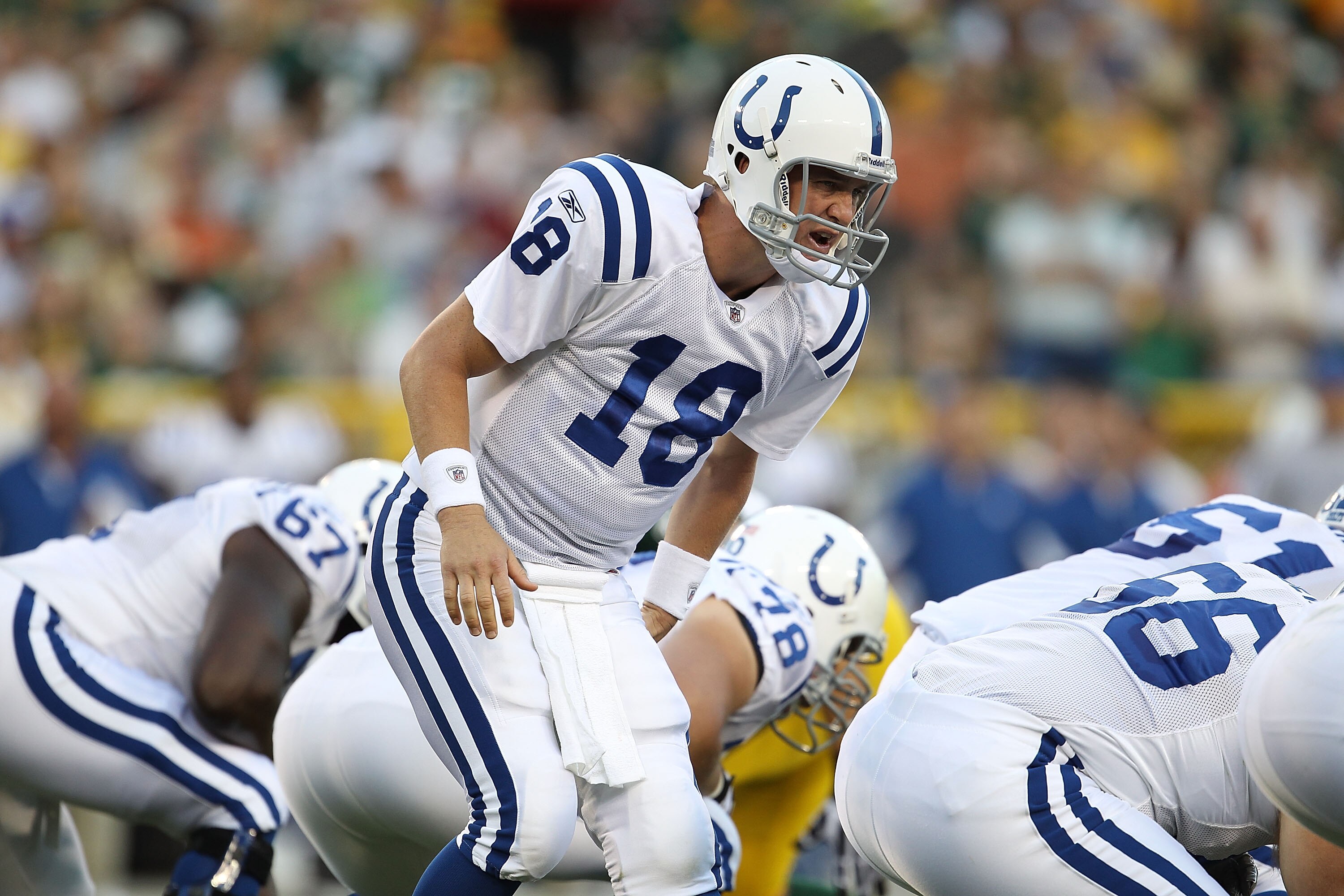GREEN BAY, WI - AUGUST 26: Peyton Manning #18 of the Indianapolis Colts calls a play during a preseason game against the Green Bay Packers at Lambeau Field on August 26, 2010 in Green Bay, Wisconsin. The Packers defeated the Colts 59-24.  (Photo by Jonath