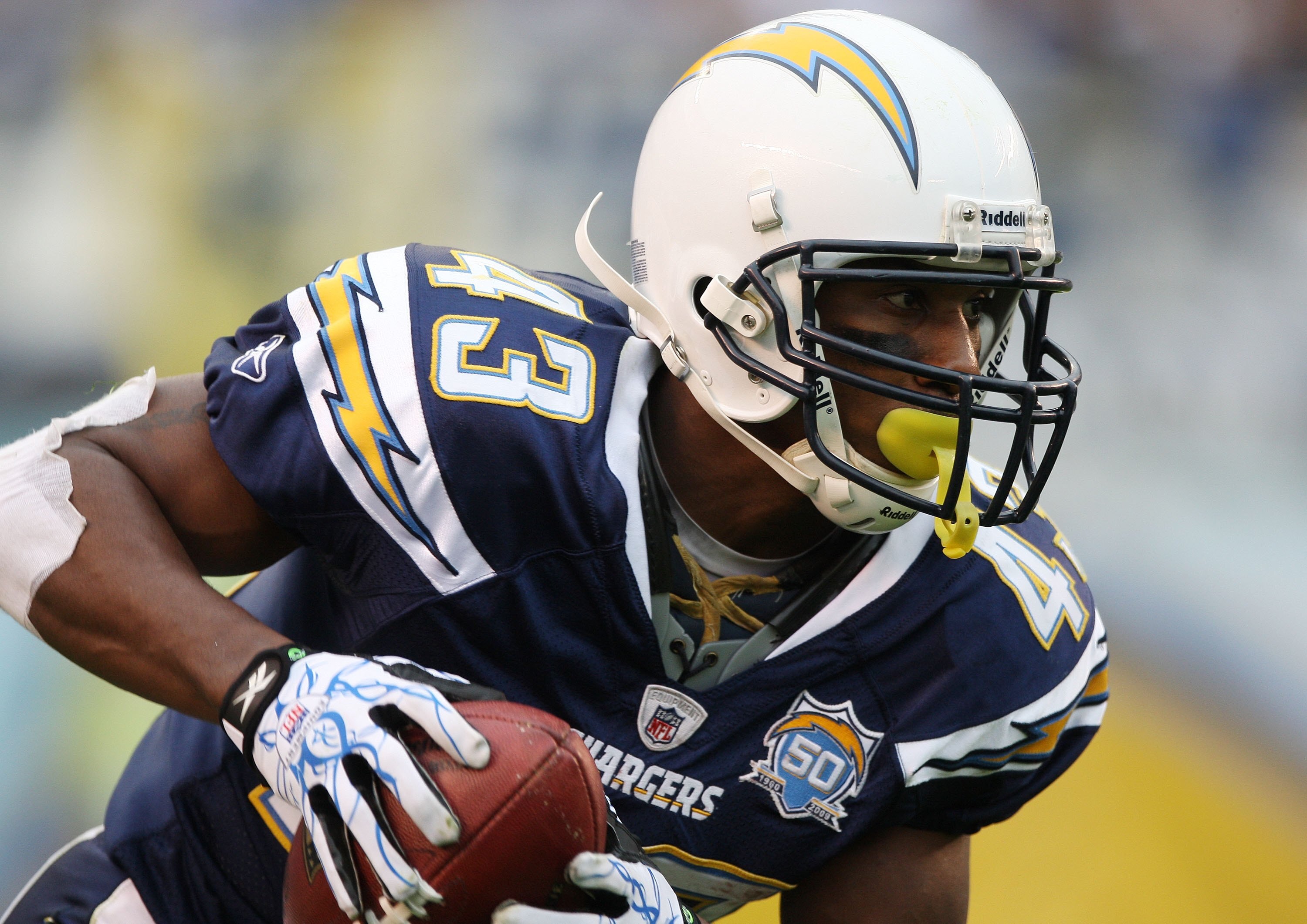 SAN DIEGO - JANUARY 17:  Running back Darren Sproles #43 of the San Diego Chargers runs with the ball during the AFC Divisional Playoff Game against the New York Jets at Qualcomm Stadium on January 17, 2010 in San Diego, California.  (Photo by Donald Mira