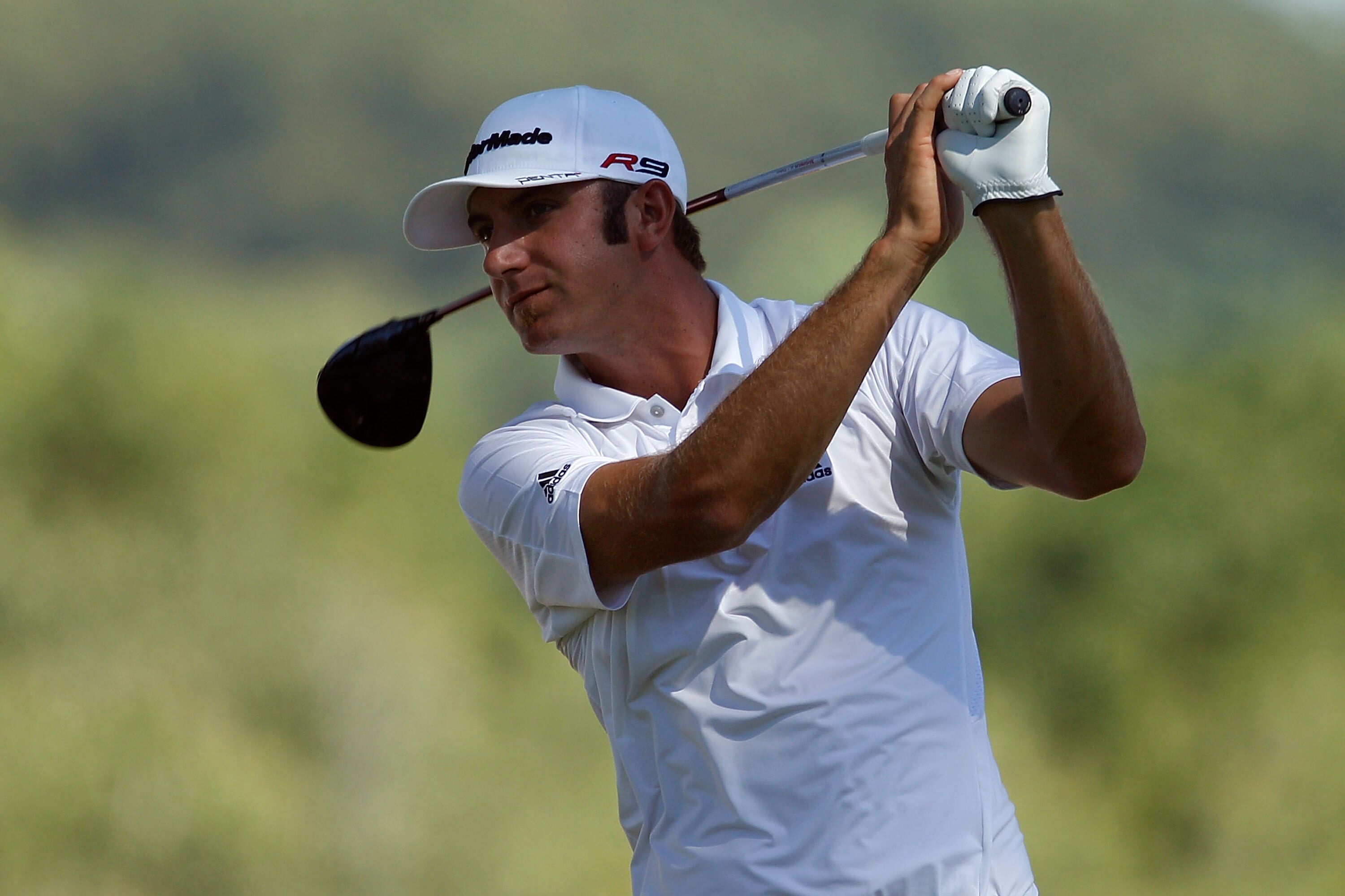 PARAMUS, NJ - AUGUST 29:  Dustin Johnson watches his tee shot on the sixth hole during the final round of The Barclays at the Ridgewood Country Club on August 29, 2010 in Paramus, New Jersey.  (Photo by Scott Halleran/Getty Images)
