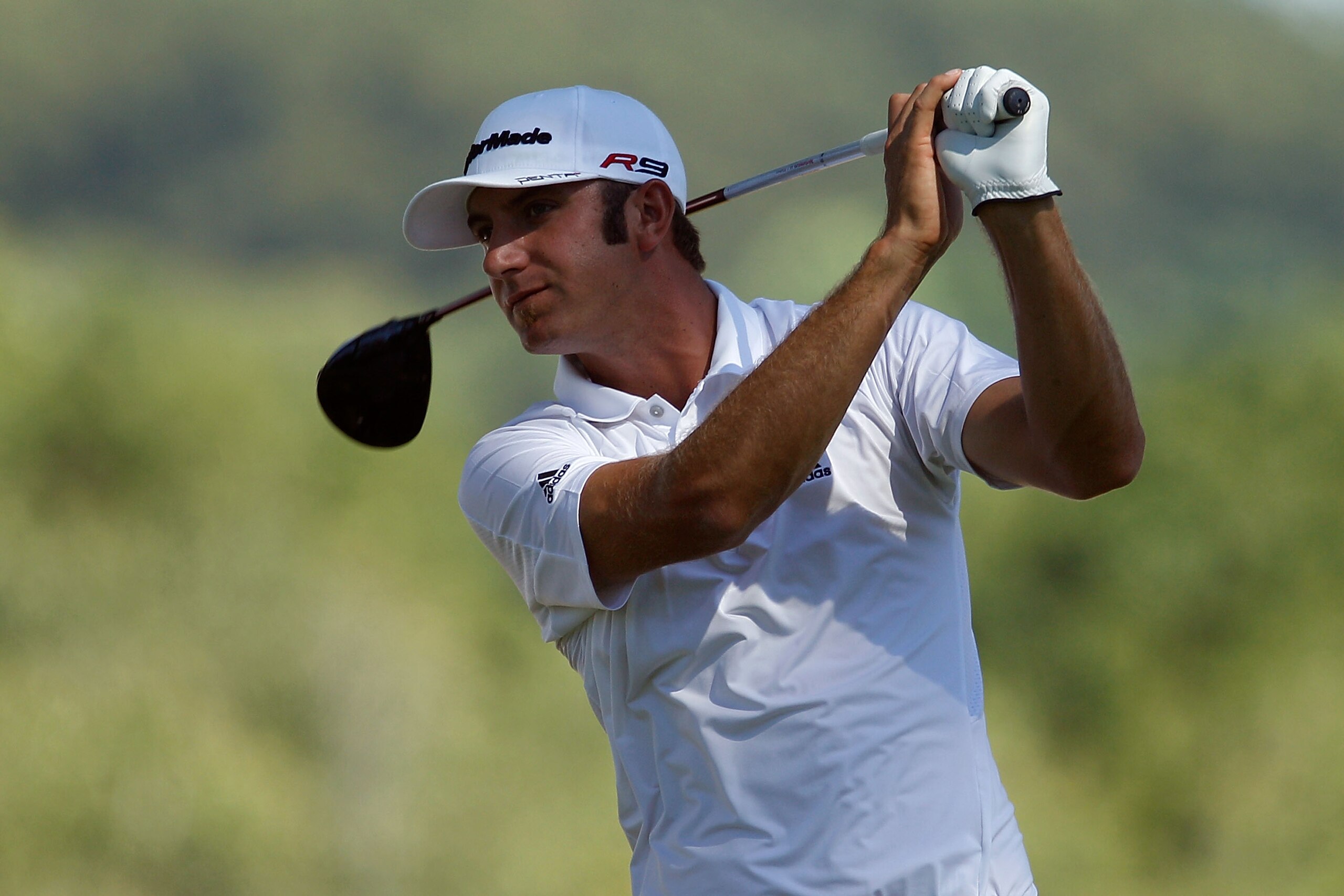PARAMUS, NJ - AUGUST 29:  Dustin Johnson watches his tee shot on the sixth hole during the final round of The Barclays at the Ridgewood Country Club on August 29, 2010 in Paramus, New Jersey.  (Photo by Scott Halleran/Getty Images)