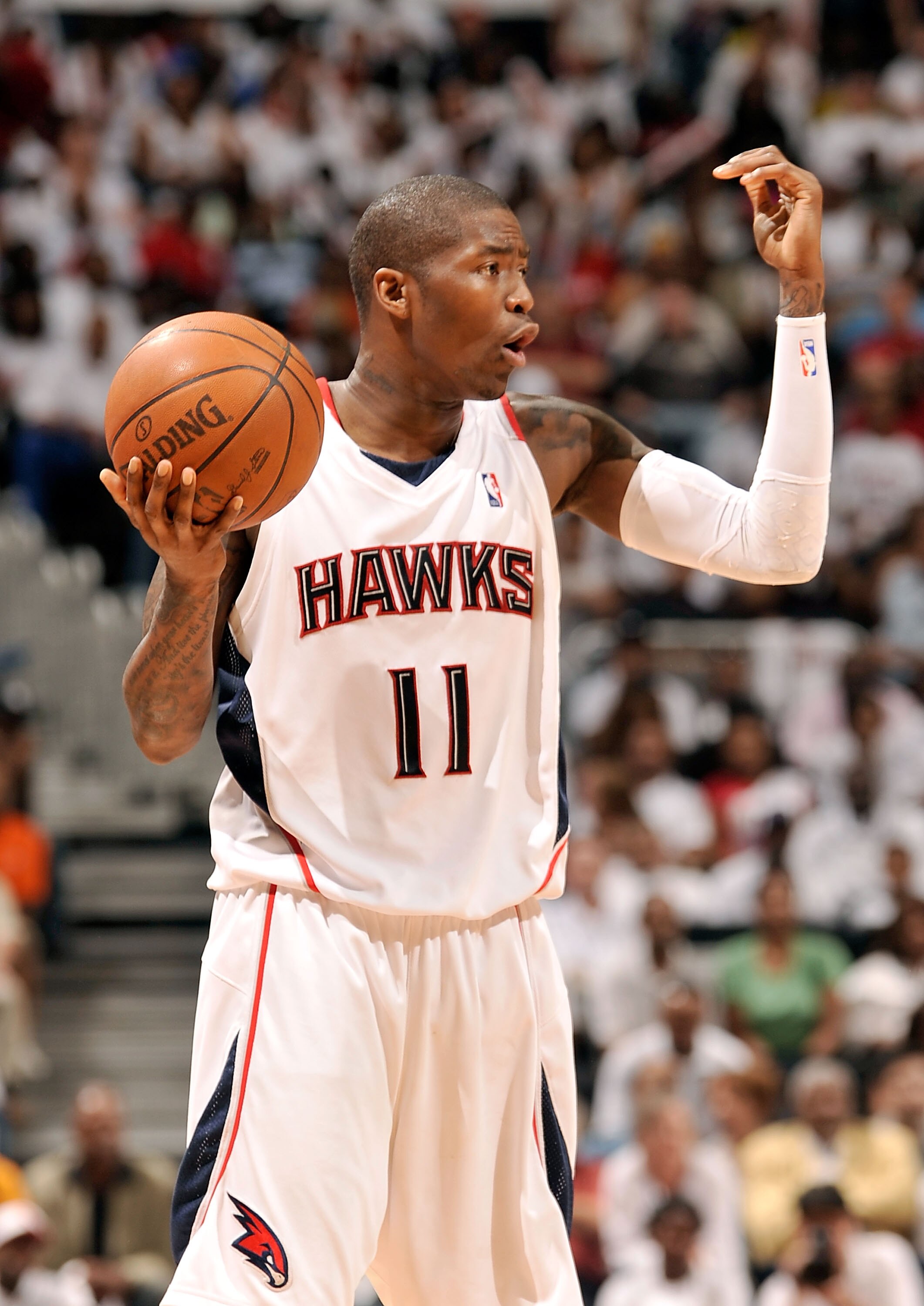 ATLANTA - APRIL 17:  Jamal Crawford #11 of the Atlanta Hawks calls a play against the Milwaukee Bucks during Game One of the Eastern Conference Quarterfinals of the 2010 NBA Playoffs at Philips Arena on April 17, 2010 in Atlanta, Georgia. NOTE TO USER: Us