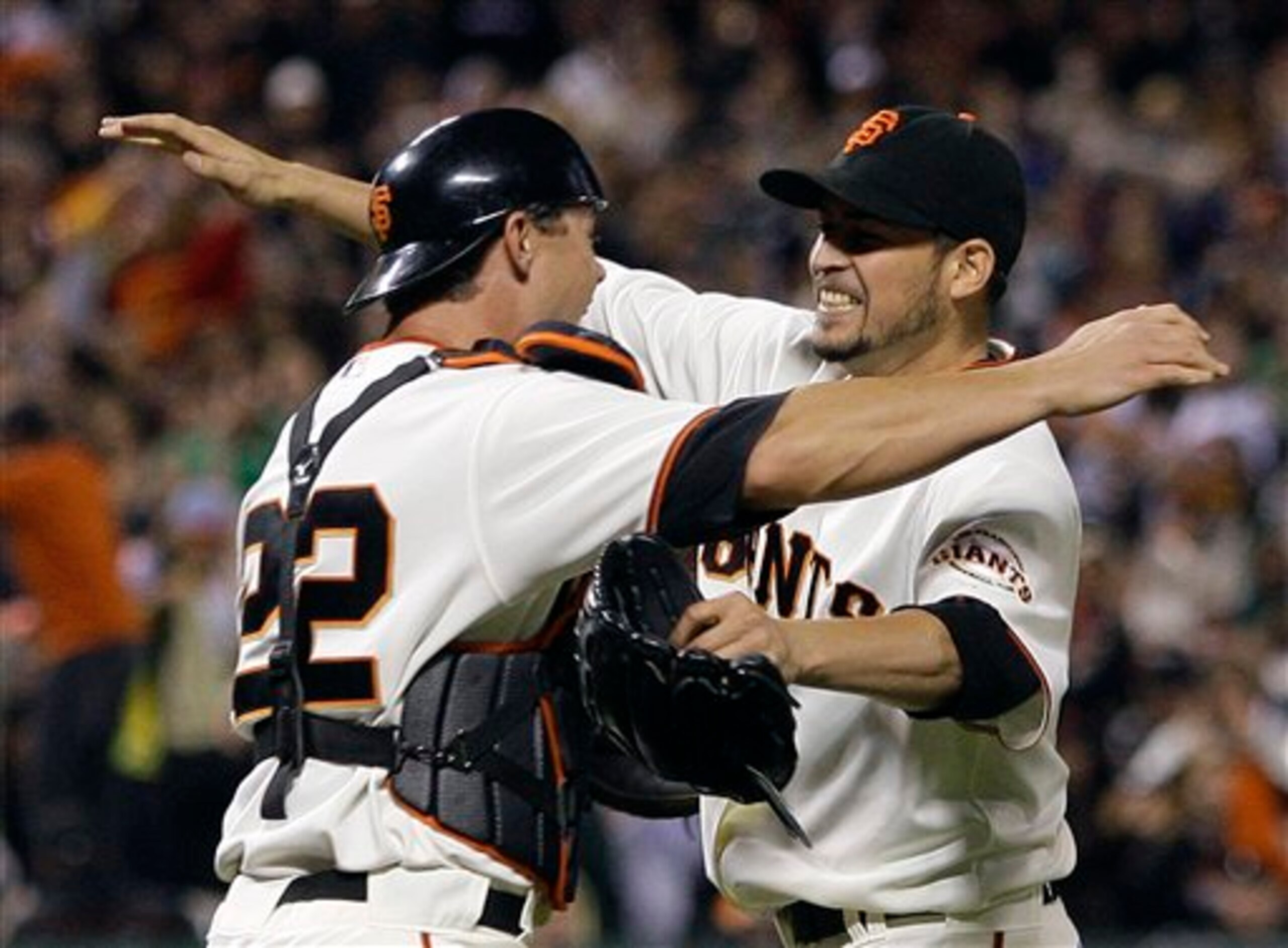 Sanchez hugging catcher, Whiteside and celebrating his no-hitter on July 10, 2009. (Vs SDP)