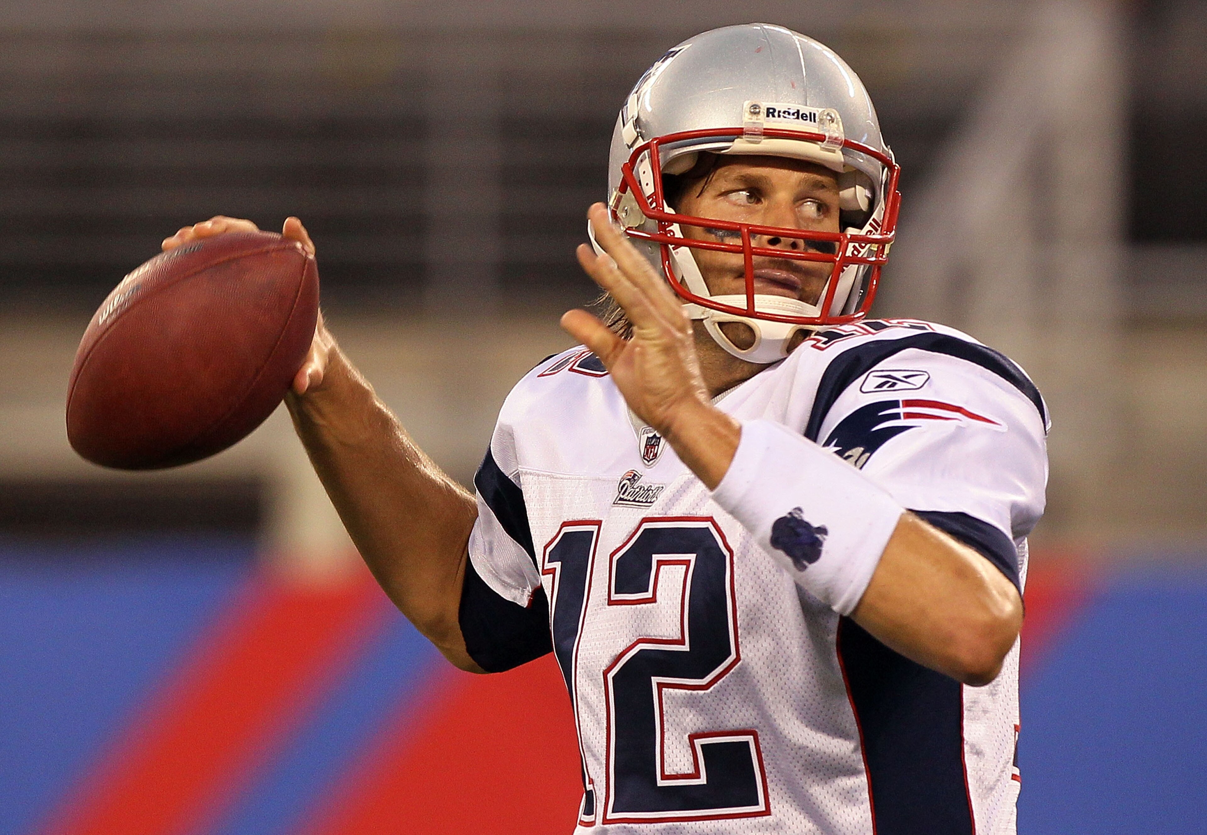EAST RUTHERFORD, NJ - SEPTEMBER 02:  Tom Brady #12 of the New England Patriots throws a first quarter pass against the New York Giants on September 2, 2010 at the New Meadowlands Stadium in East Rutherford, New Jersey.  (Photo by Jim McIsaac/Getty Images)