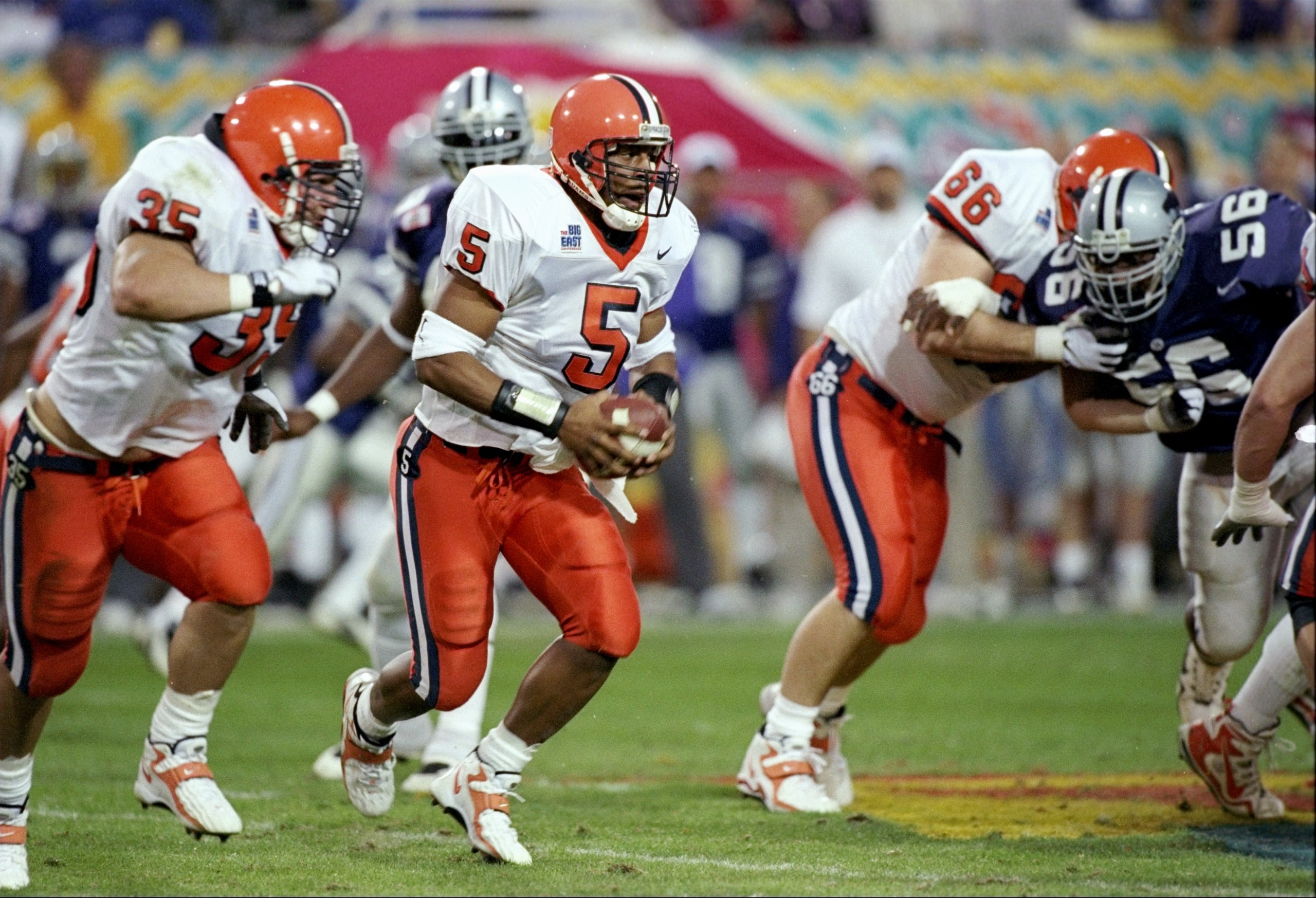 31 Dec 1997: Quarterback Donovan McNabb #5 of Syracuse carries out an option during the Orangemen 35-18 loss to Kansas State during the Fiesta Bowl at Sun Devil Stadium in Tempe, Arizona.