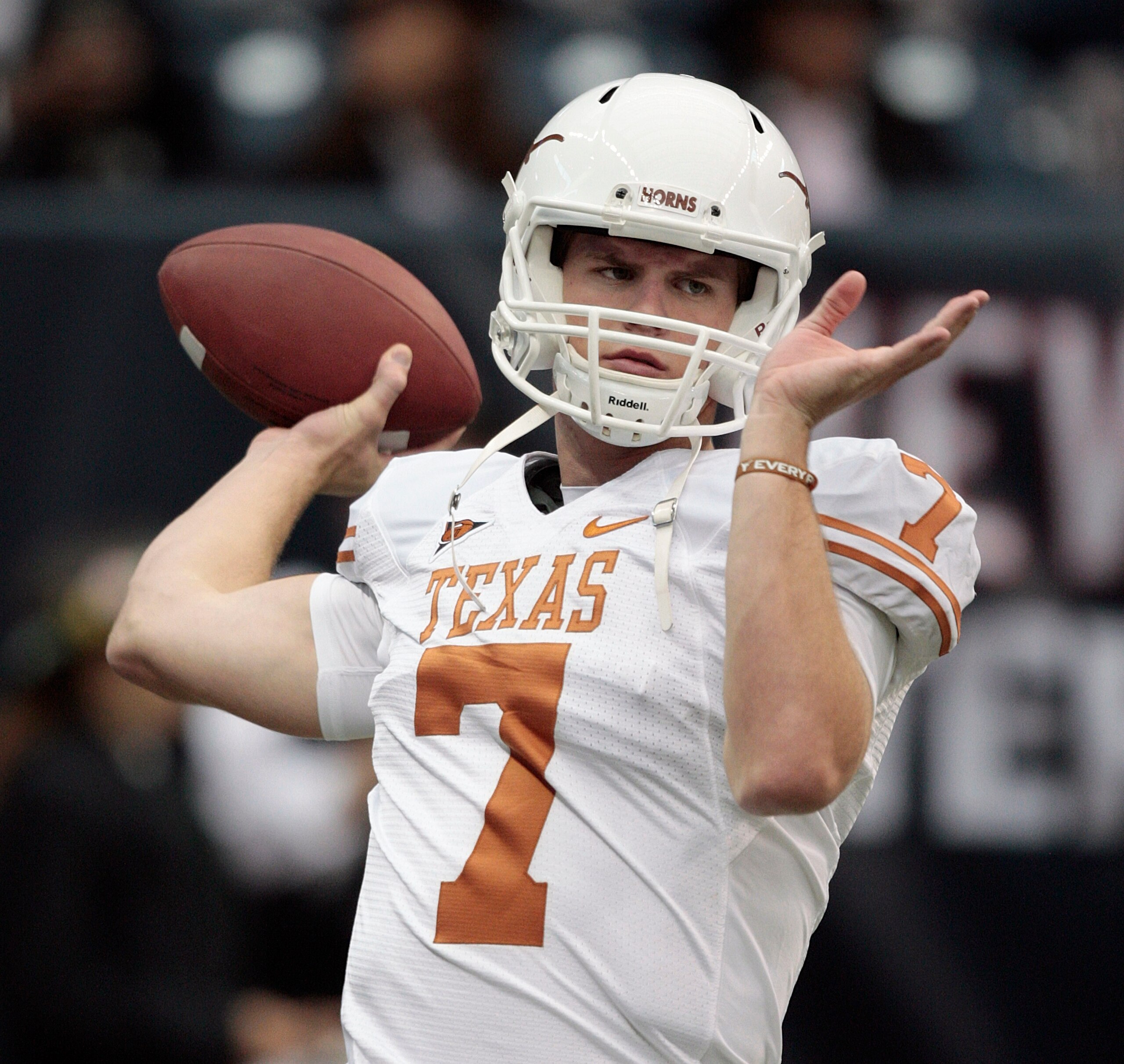HOUSTON - SEPTEMBER 04: Quarterback Garrett Gilbert #7 of the Texas Lonhgorns throws passes during pre-game warmups before playing the Rice Owls at Reliant Stadium on September 4, 2010 in Houston, Texas. Texas beat Rice 34-17. (Photo by Bob Levey/Getty HOUSTON - SEPTEMBER 04: Quarterback Garrett Gilbert #7 of the Texas Lonhgorns throws passes during pre-game warmups before playing the Rice Owls at Reliant Stadium on September 4, 2010 in Houston, Texas. Texas beat Rice 34-17. (Photo by Bob Levey/Getty