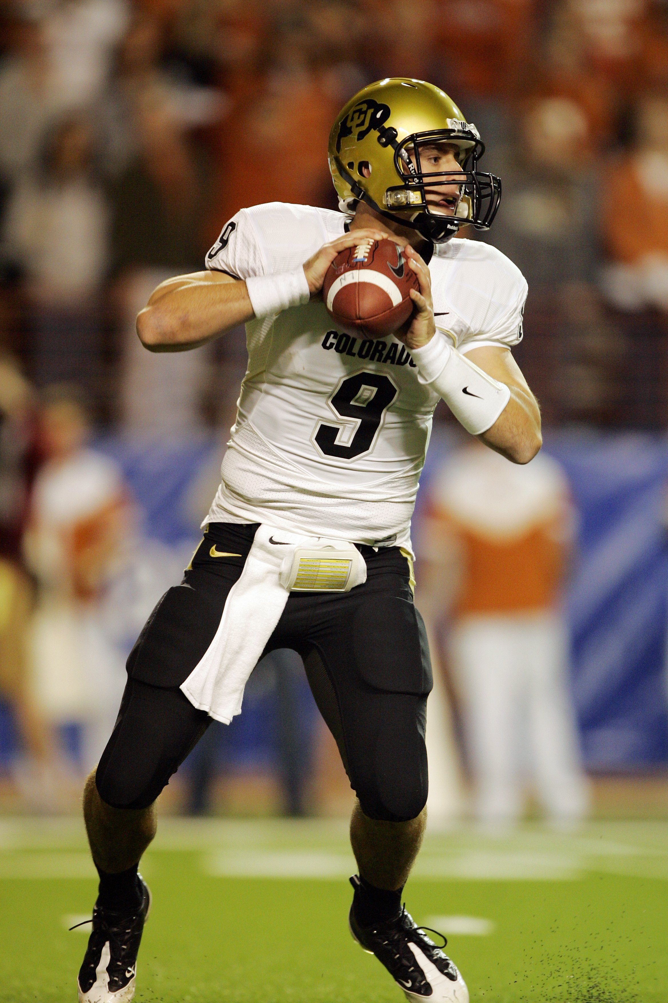 AUSTIN, TX - OCTOBER 10:  Quarterback Tyler Hansen #9 of the Colorado Buffaloes looks for a receiver against the Texas Longhorns on October 10, 2009 at Darrell K Royal-Texas Memorial Stadium in Austin, Texas.  Texas won 38-14.  (Photo by Brian Bahr/Getty