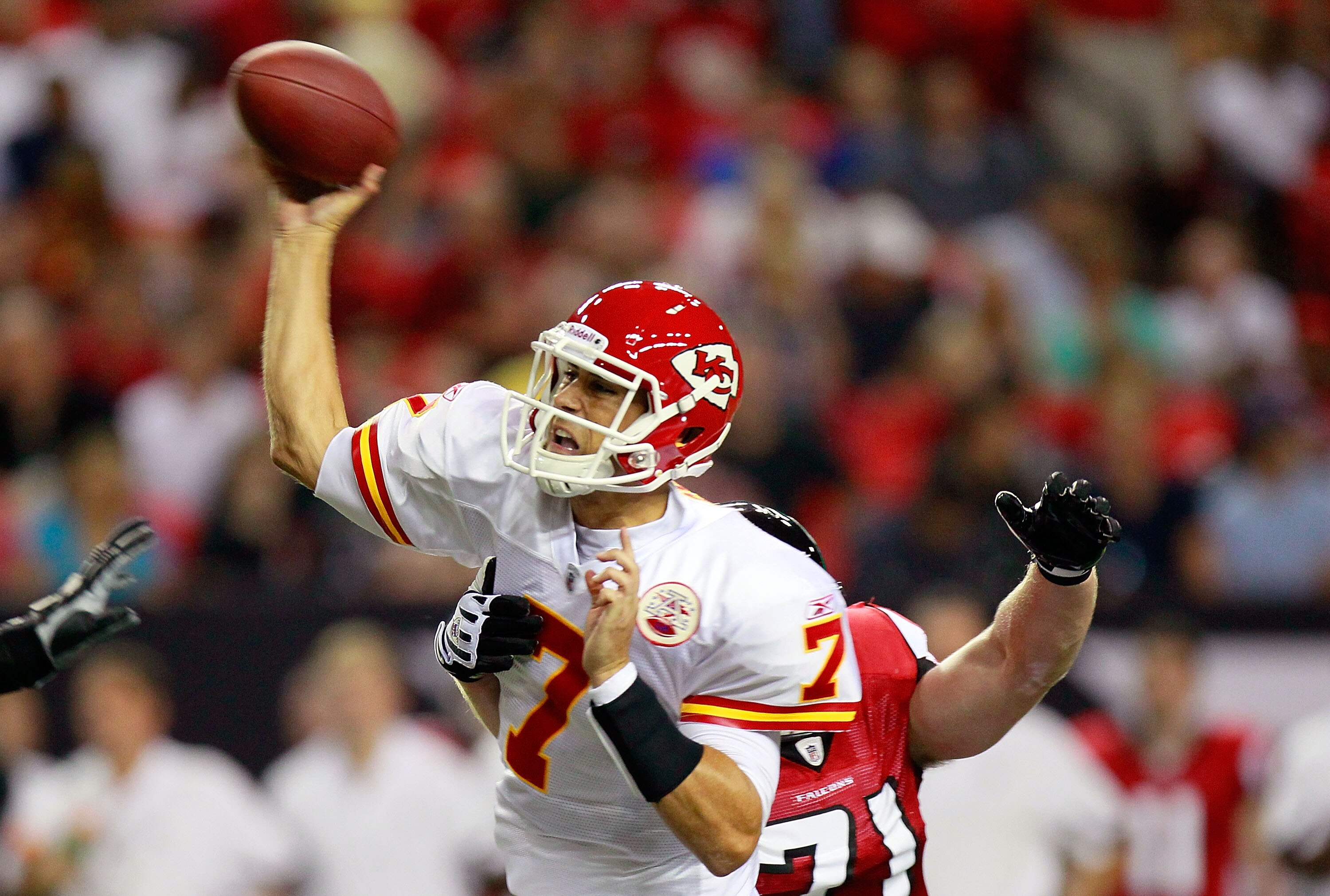 ATLANTA - AUGUST 13:  Quarterback Matt Cassel #7 of the Kansas City Chiefs is pressured by Kroy Biermann #71 of the Atlanta Falcons at Georgia Dome on August 13, 2010 in Atlanta, Georgia.  (Photo by Kevin C. Cox/Getty Images)