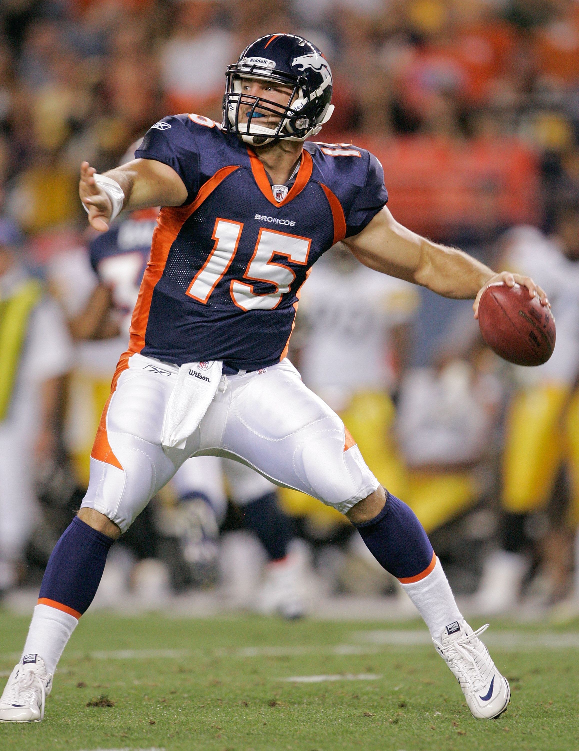 DENVER - AUGUST 29: Quarterback Tim Tebow #15 of the Denver Broncos makes a pass against the Pittsburgh Steelers at INVESCO Field at Mile High on August 29, 2010 in Denver, Colorado.  (Photo by Justin Edmonds/Getty Images)