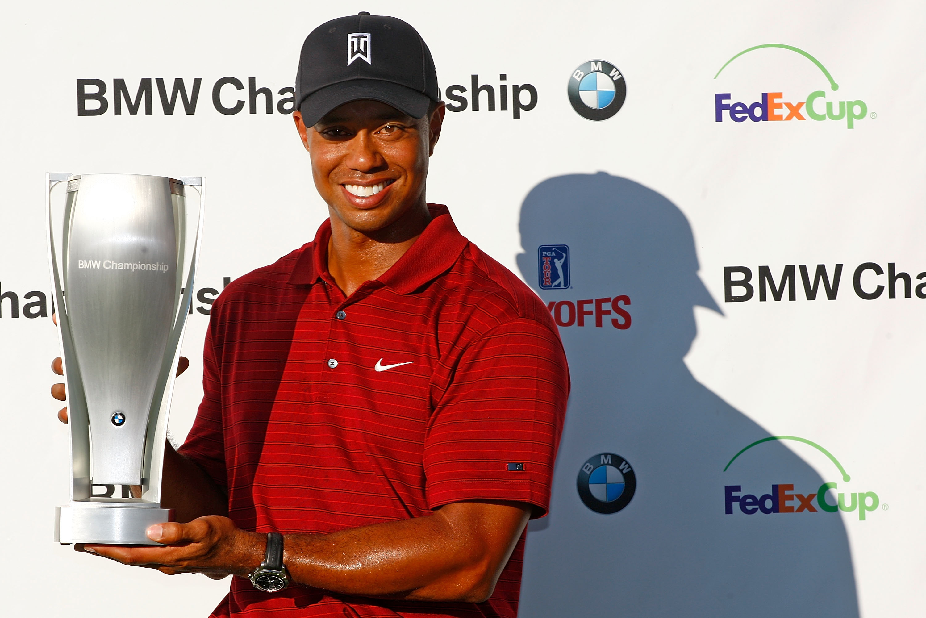 LEMONT, IL - SEPTEMBER 13:  Tiger Woods poses with the trophy after his eight-stroke victory at the BMW Championship held at Cog Hill Golf & CC on September 13, 2009 in Lemont, Illinois.  (Photo by Scott Halleran/Getty Images)