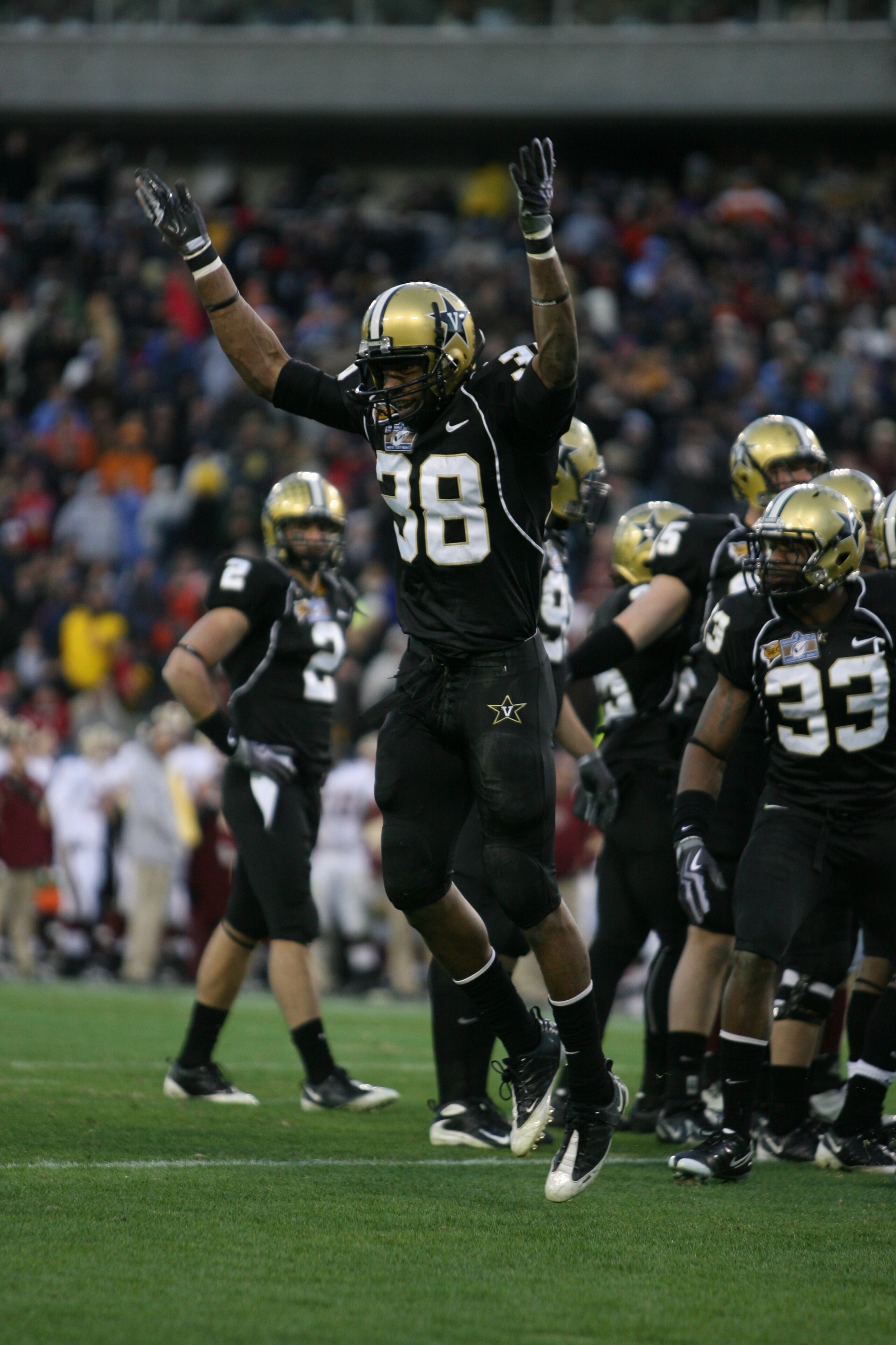 NASHVILLE, TN - DECEMBER 31:  Sean Richardson #38 of the Vanderbilt Commodores celebrates against the Boston College Eagles during the Gaylord Hotels Music City Bowl at LP Field on December 31, 2008 in Nashville, Tennessee.  (Photo by Andy Lyons/Getty Ima