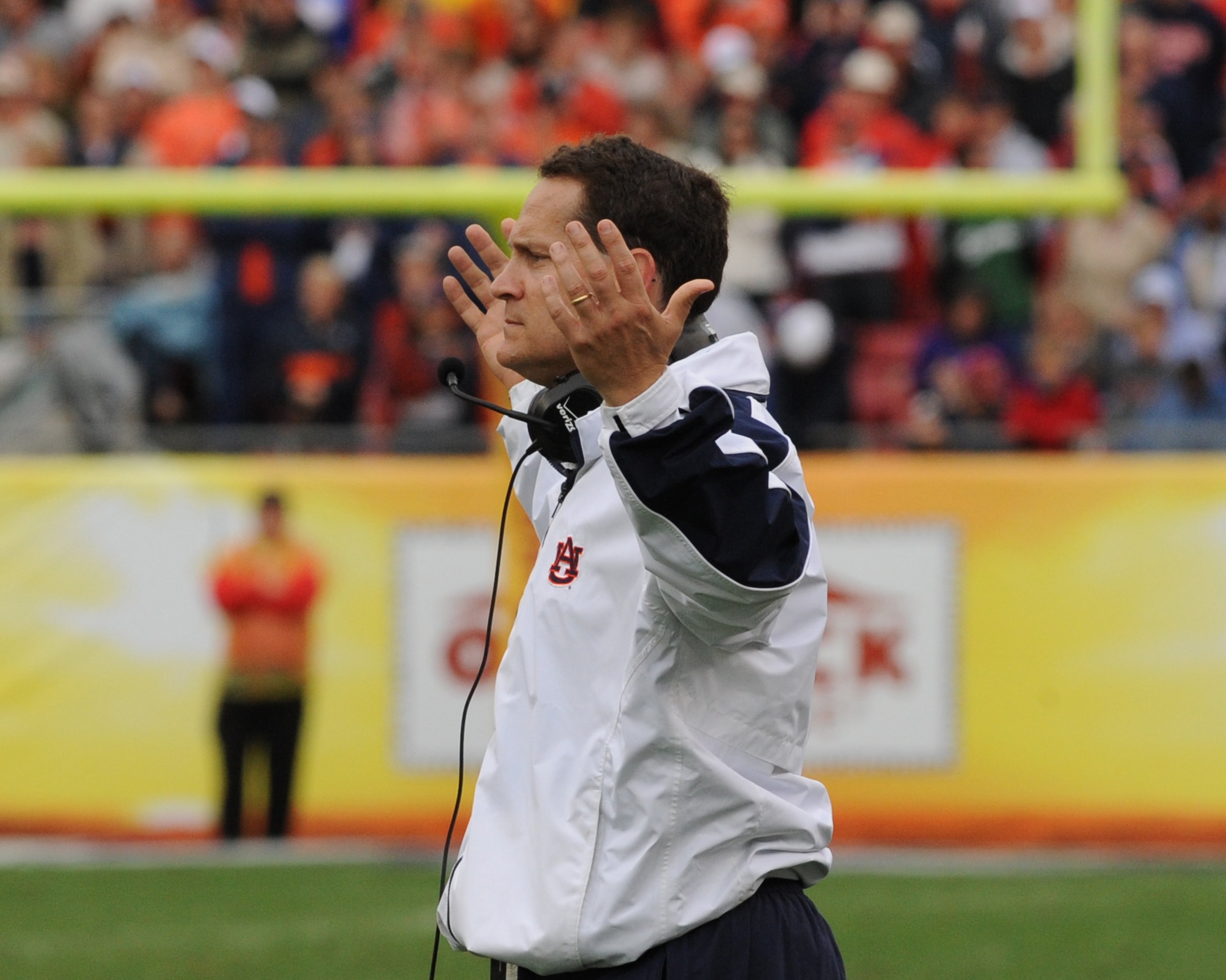 TAMPA, FL - JANUARY 1: Coach Gene Chizik of the Auburn Tigers directs play against the Northwestern Wildcats in the Outback Bowl January 1, 2010 at Raymond James Stadium in Tampa, Florida.  (Photo by Al Messerschmidt/Getty Images)