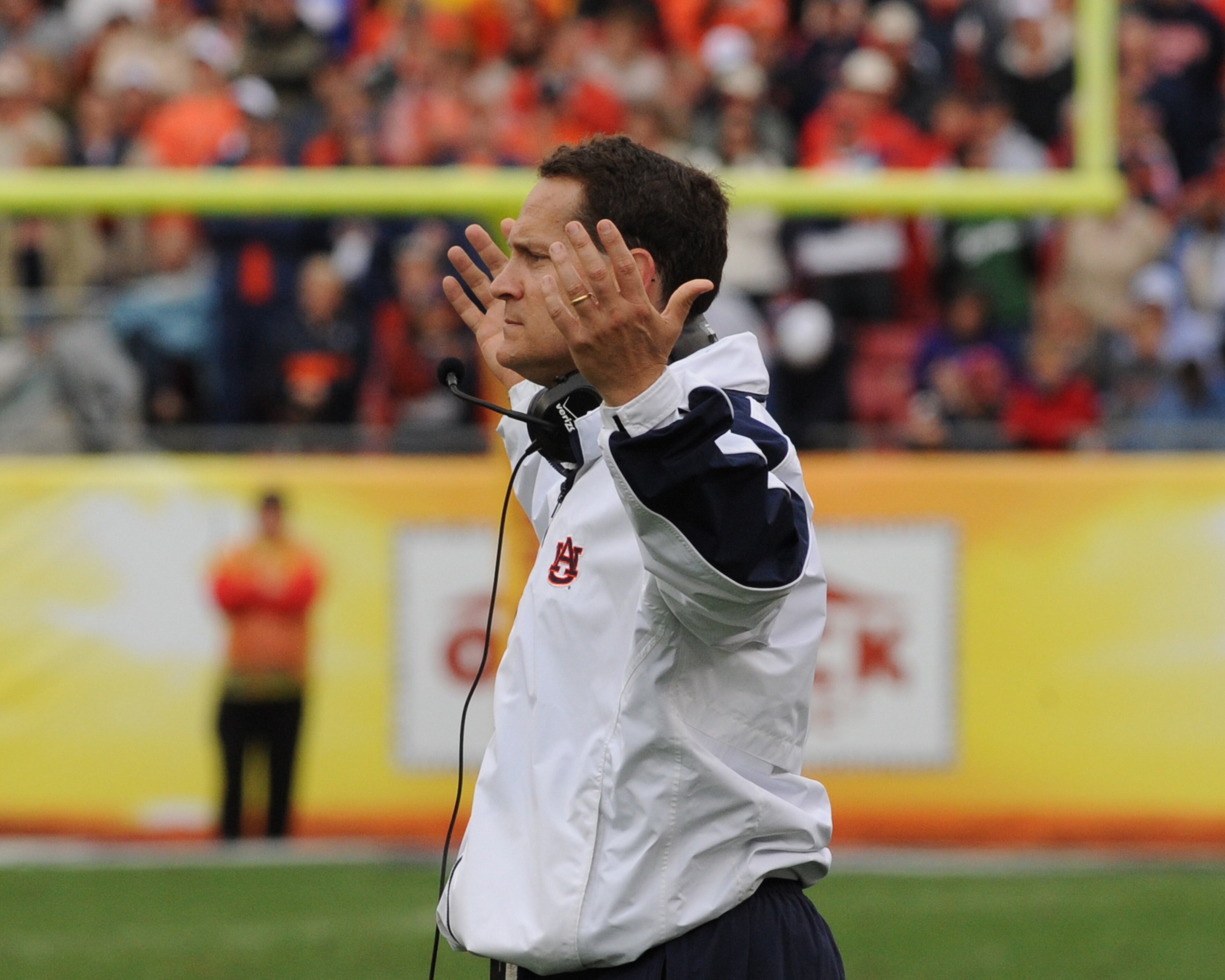 TAMPA, FL - JANUARY 1: Coach Gene Chizik of the Auburn Tigers directs play against the Northwestern Wildcats in the Outback Bowl January 1, 2010 at Raymond James Stadium in Tampa, Florida.  (Photo by Al Messerschmidt/Getty Images)
