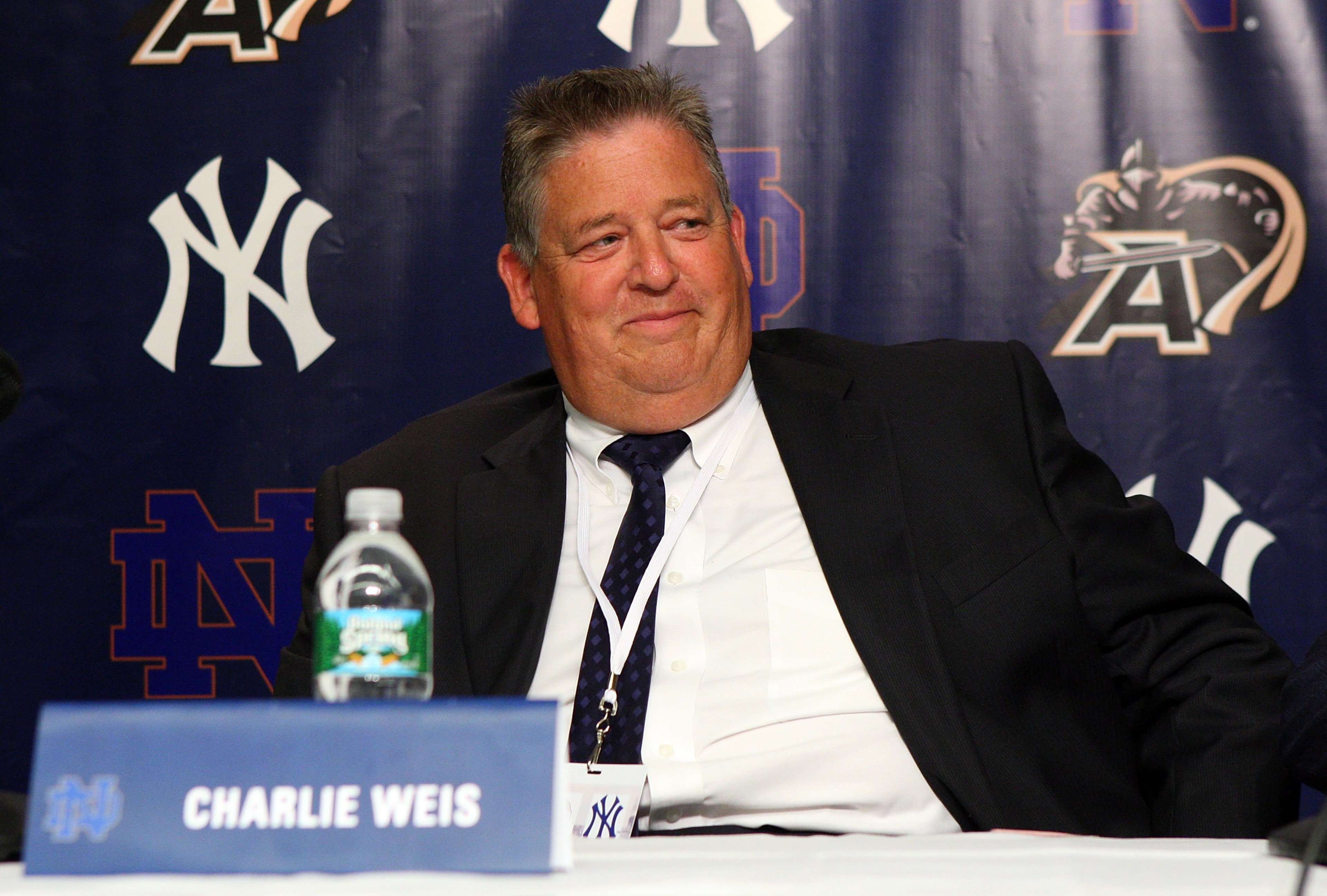 NEW YORK - JULY 20: Notre Dame head coach Charlie Weiss looks on during a press conference announcing that Yankee Stadium will play host to the 2010 Notre Dame v Army college football game on July 19, 2009 at Yankee Stadium in the Bronx borough of New Yo NEW YORK - JULY 20: Notre Dame head coach Charlie Weiss looks on during a press conference announcing that Yankee Stadium will play host to the 2010 Notre Dame v Army college football game on July 19, 2009 at Yankee Stadium in the Bronx borough of New Yo