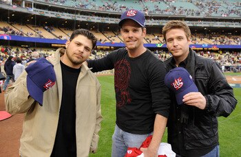 LOS ANGELES - MARCH 22: (L-R) Actors Jerry Ferrara, Kevin Dillon and Kevin Connolly pose with hats the United States baseball team before the semifinal game of the 2009 World Baseball Classic against Japan on March 22, 2009 at Dodger Stadium in Los Angele