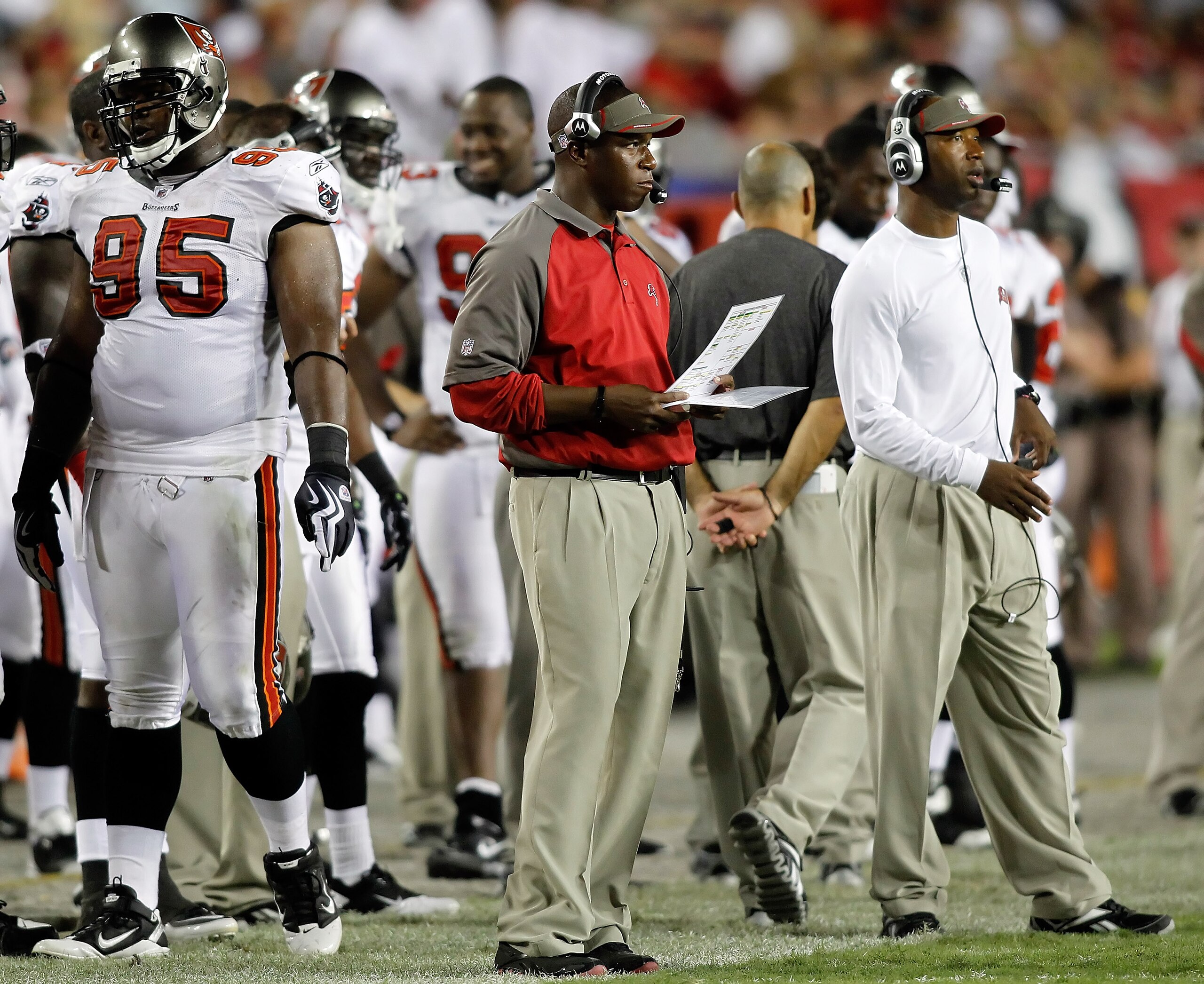 TAMPA, FL - AUGUST 28:  Head coach Raheem Morris of the Tampa Bay Buccaneers looks over his play sheet against the Jacksonville Jaguars during a preseason game at Raymond James Stadium on August 28, 2010 in Tampa, Florida.  (Photo by J. Meric/Getty Images