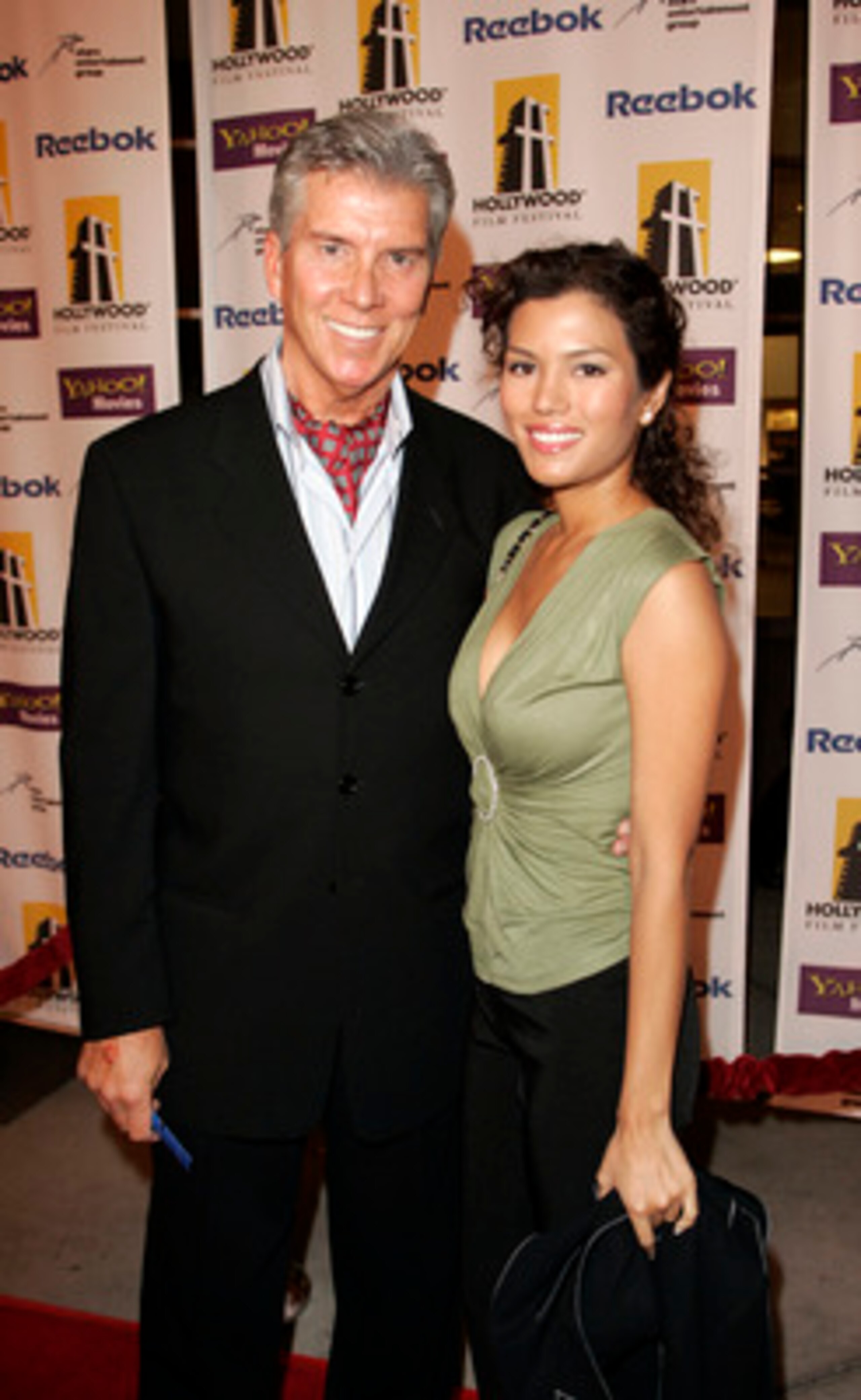 LOS ANGELES - OCTOBER 20: Sports personality Michael Buffer (L) and Christine Prado arrive at the Hollywood Film Festival presentation of 'Bullets Over Hollywood' at the Arclight Theatre October 20, 2005 in Los Angeles, California. (Photo by Michael Buc LOS ANGELES - OCTOBER 20: Sports personality Michael Buffer (L) and Christine Prado arrive at the Hollywood Film Festival presentation of 'Bullets Over Hollywood' at the Arclight Theatre October 20, 2005 in Los Angeles, California. (Photo by Michael Buc