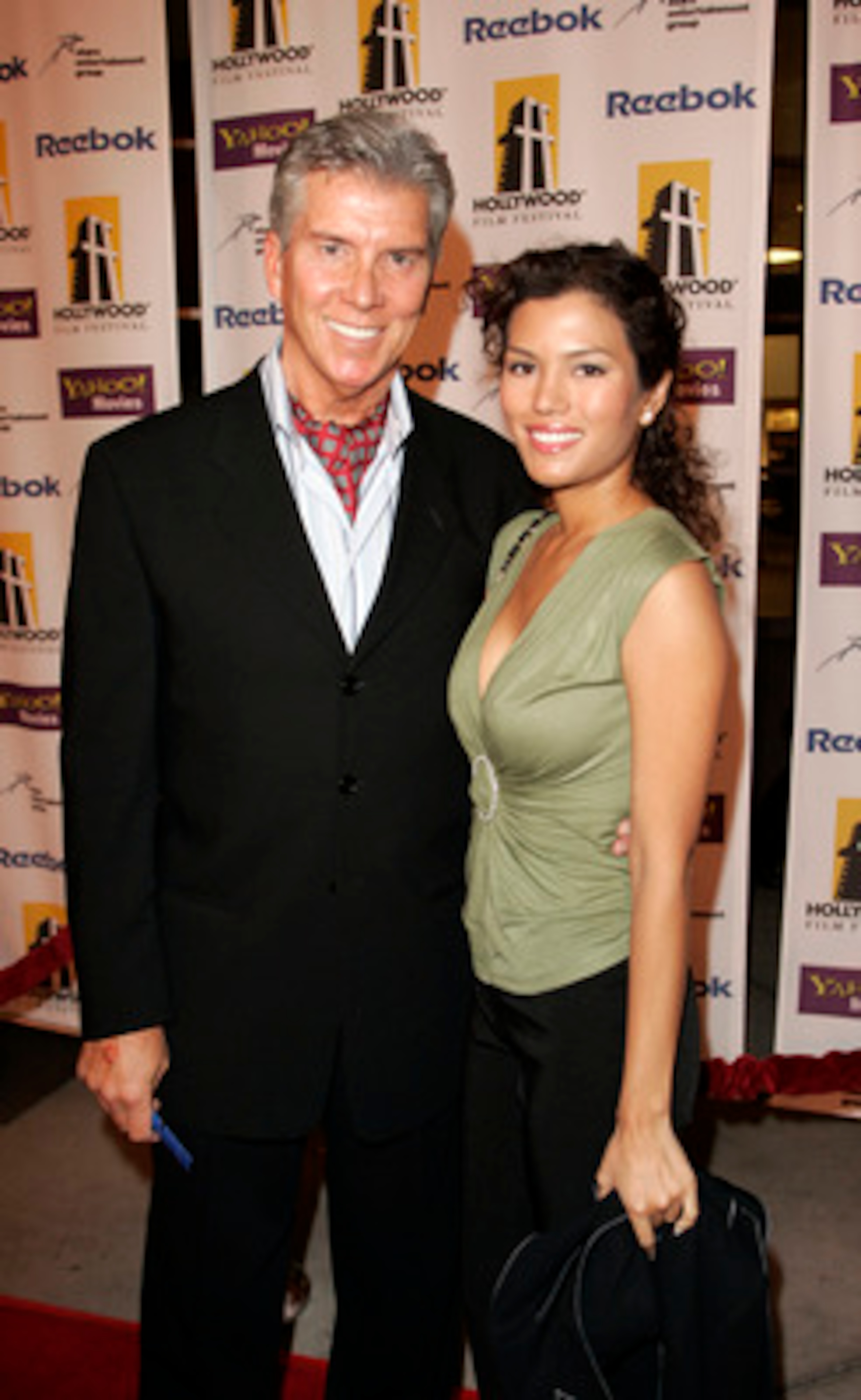 LOS ANGELES - OCTOBER 20:  Sports personality Michael Buffer (L) and Christine Prado arrive at the Hollywood Film Festival presentation of 'Bullets Over Hollywood' at the Arclight Theatre October 20, 2005 in Los Angeles, California.  (Photo by Michael Buc