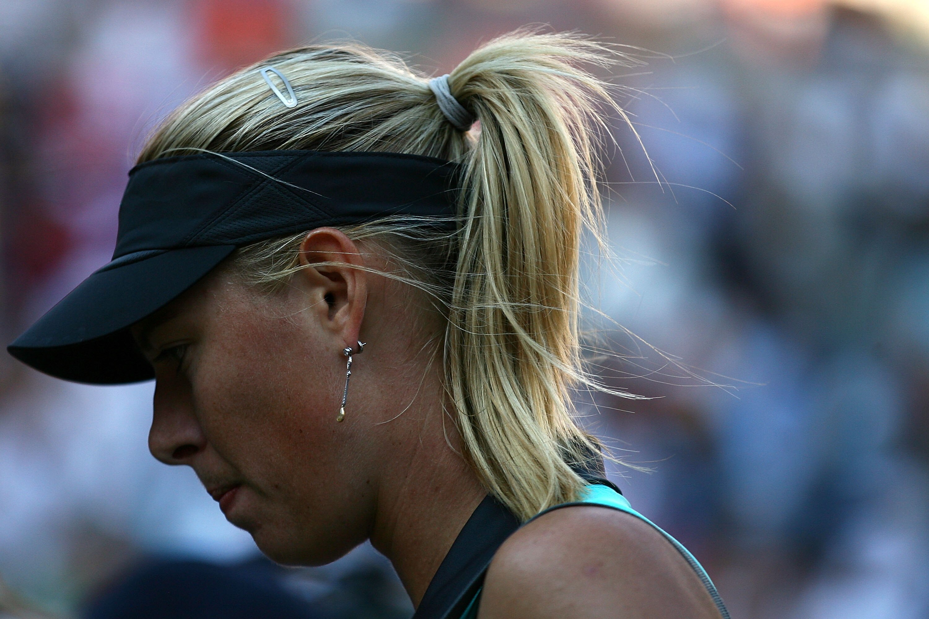 NEW YORK - SEPTEMBER 06:  Maria Sharapova of Russia stands on the court during play against Caroline Wozniacki of Denmark during the women's singles match on day eight of the 2010 U.S. Open at the USTA Billie Jean King National Tennis Center on September